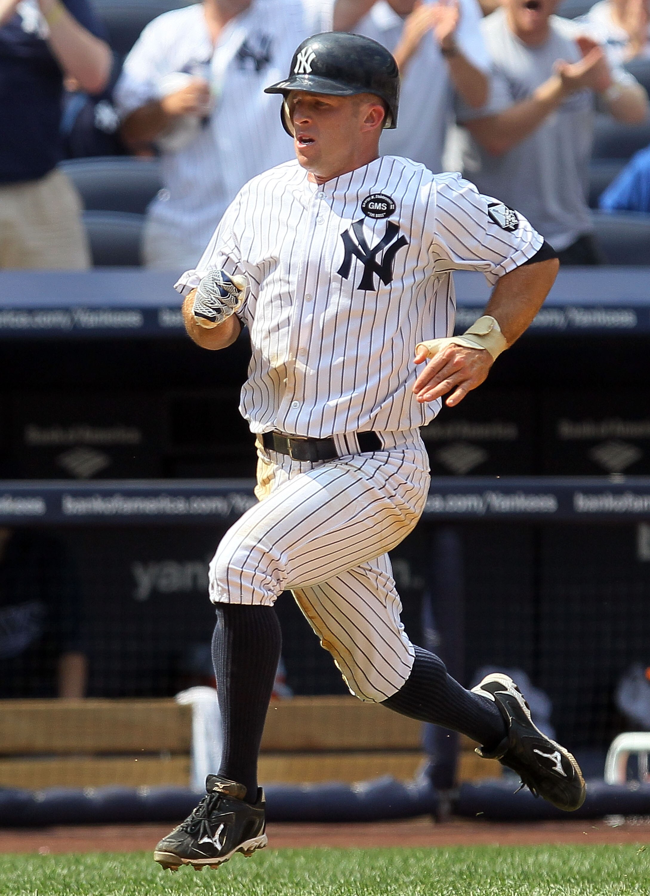 NEW YORK - JULY 18:  Brett Gardner #11 of the New York Yankees runs against the Tampa Bay Rays on July 18, 2010 at Yankee Stadium in the Bronx borough of New York City.  (Photo by Jim McIsaac/Getty Images)