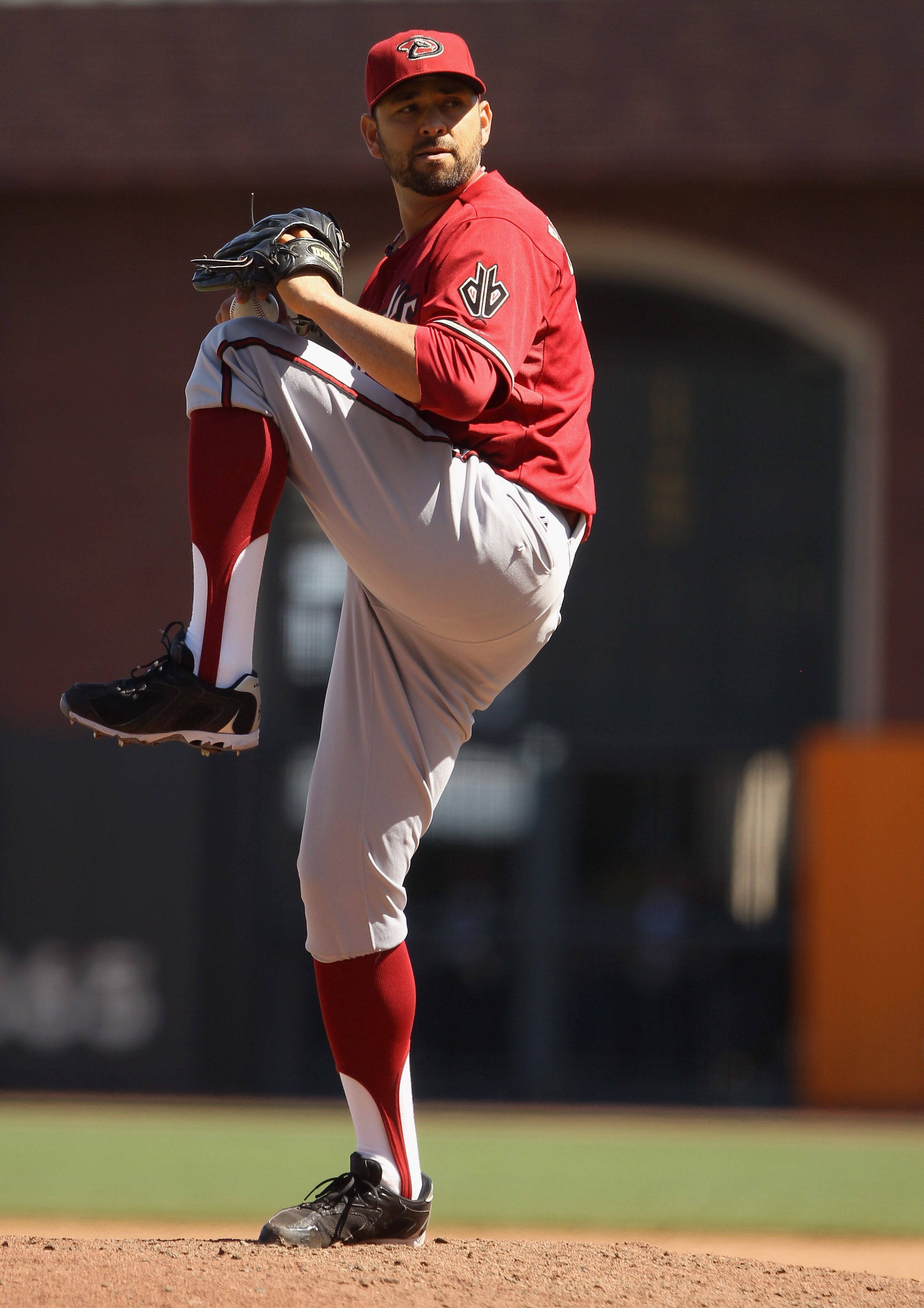 SAN FRANCISCO - AUGUST 29:  D.J. Carrasco #77 of the Arizona Diamondbacks pitches against the San Francisco Giants at AT&T Park on August 29, 2010 in San Francisco, California.  (Photo by Ezra Shaw/Getty Images)