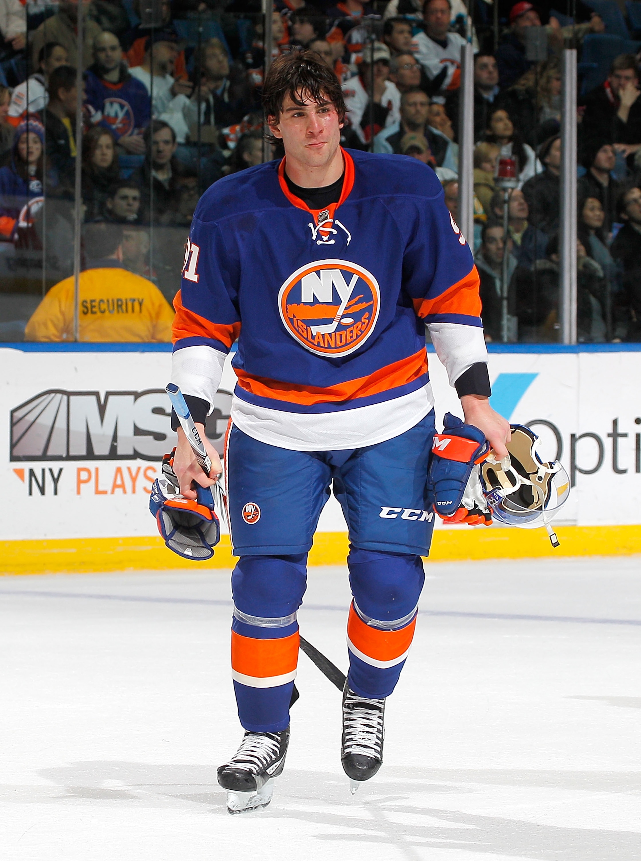 UNIONDALE, NY - FEBRUARY 05:  John Tavares #91 of the New York Islanders skates off the ice after fighting during an NHL hockey game against the Ottawa Senators at Nassau Coliseum on February 5, 2011 in Uniondale, New York.  (Photo by Paul Bereswill/Getty