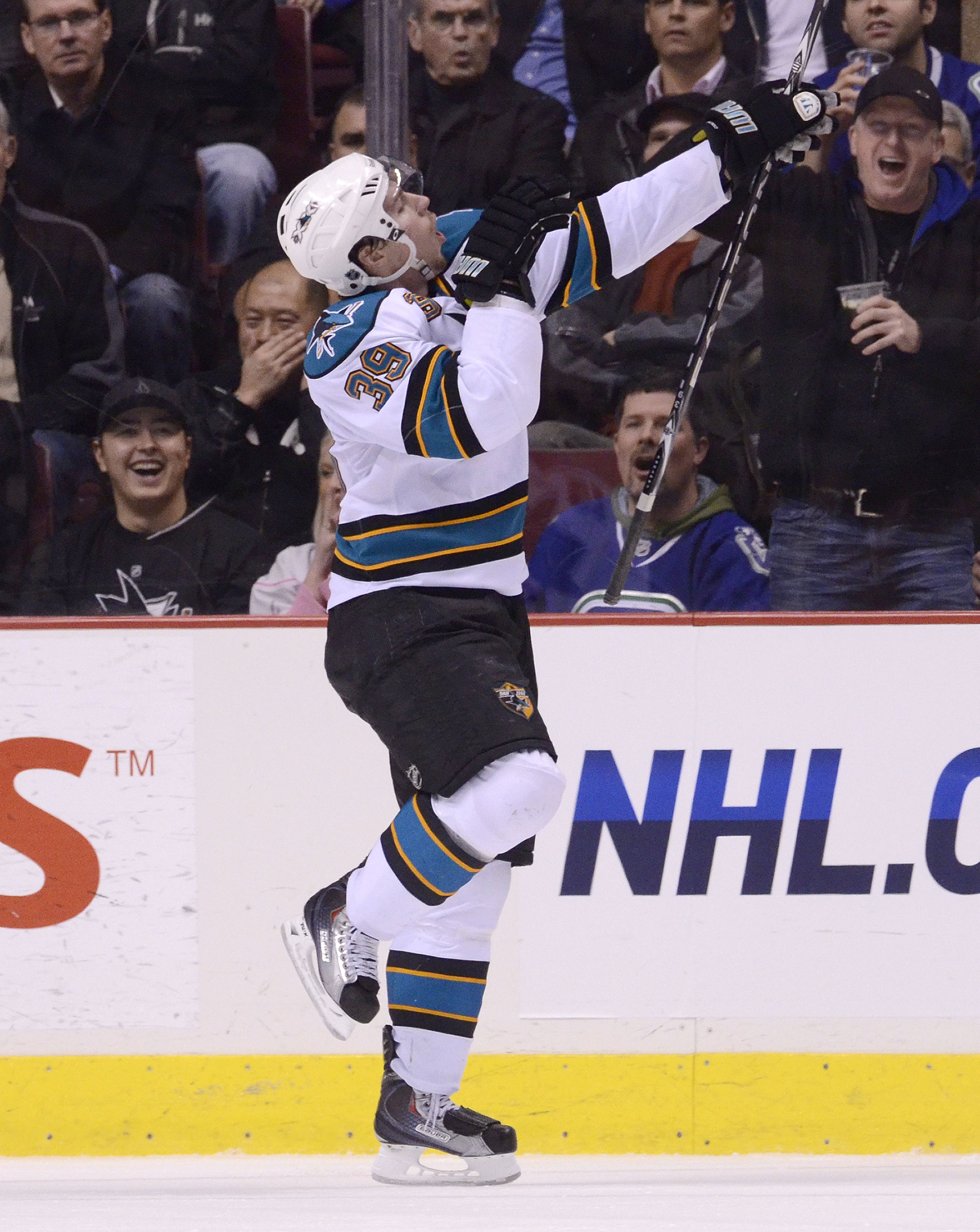 VANCOUVER, CANADA - JANUARY 20: Logan Couture #39 of the San Jose Sharks celebrates after scoring against the Vancouver Canucks during the second period in NHL action on January 20, 2011 at Rogers Arena in Vancouver, BC, Canada.  (Photo by Rich Lam/Getty