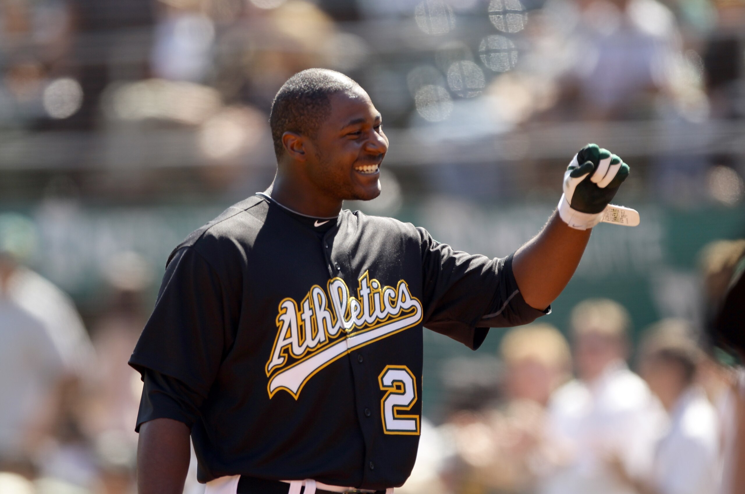 OAKLAND, CA - SEPTEMBER 22:  Chris Carter #22 of the Oakland Athletics smiles as he walks back to the dugout after hitting his first major league home run against the Chicago White Sox at the Oakland-Alameda County Coliseum on September 22, 2010 in Oaklan