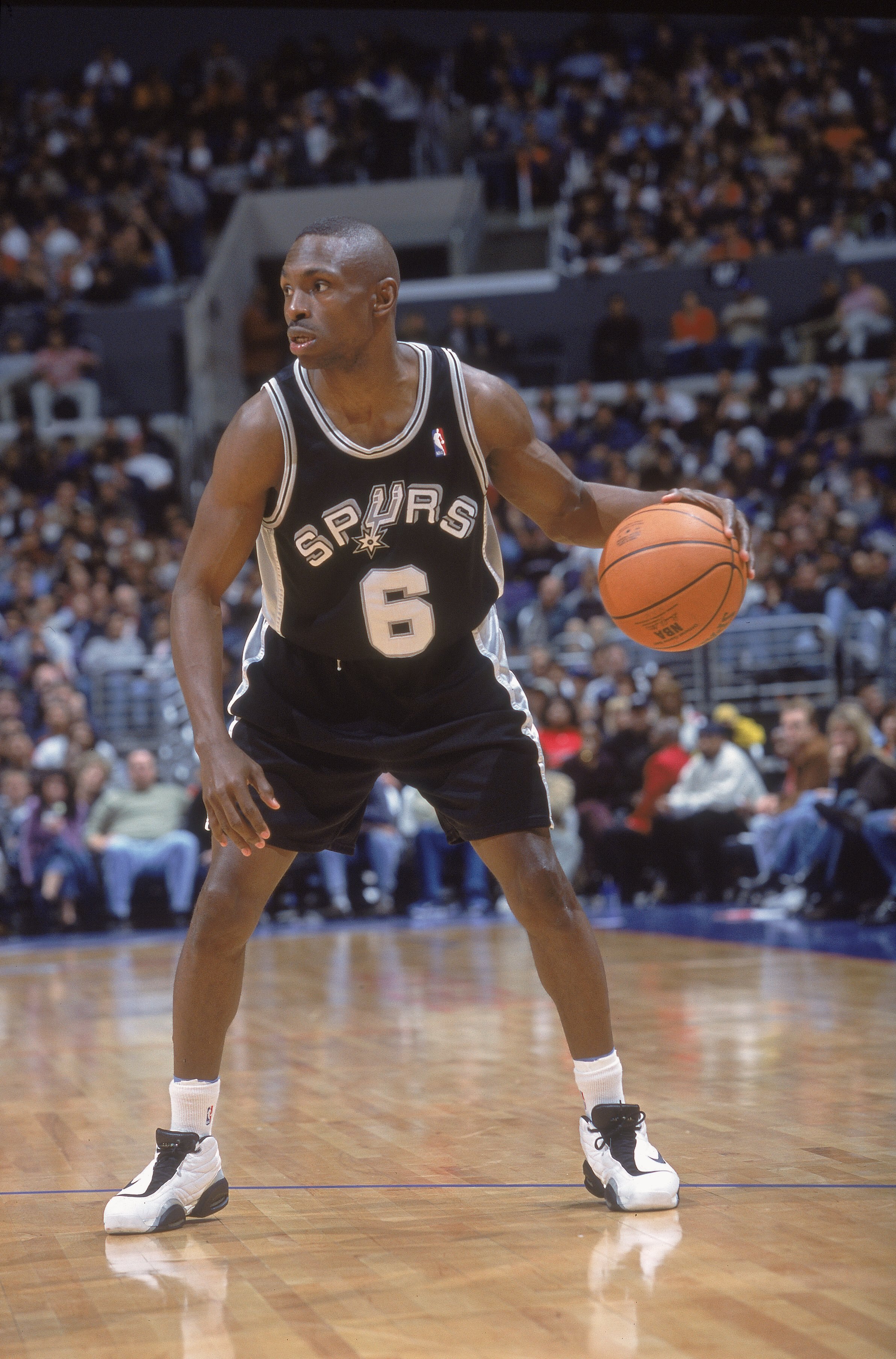 7 Apr 2001:  Avery Johnson #6 of the San Antionio Spurs dribbles the ball as he looks to move during the game against the Los Angeles Clippers at the STAPLES Center in Los Angeles, California. The Spurs defeated the Clippers 93-83..   NOTE TO USER: It is 