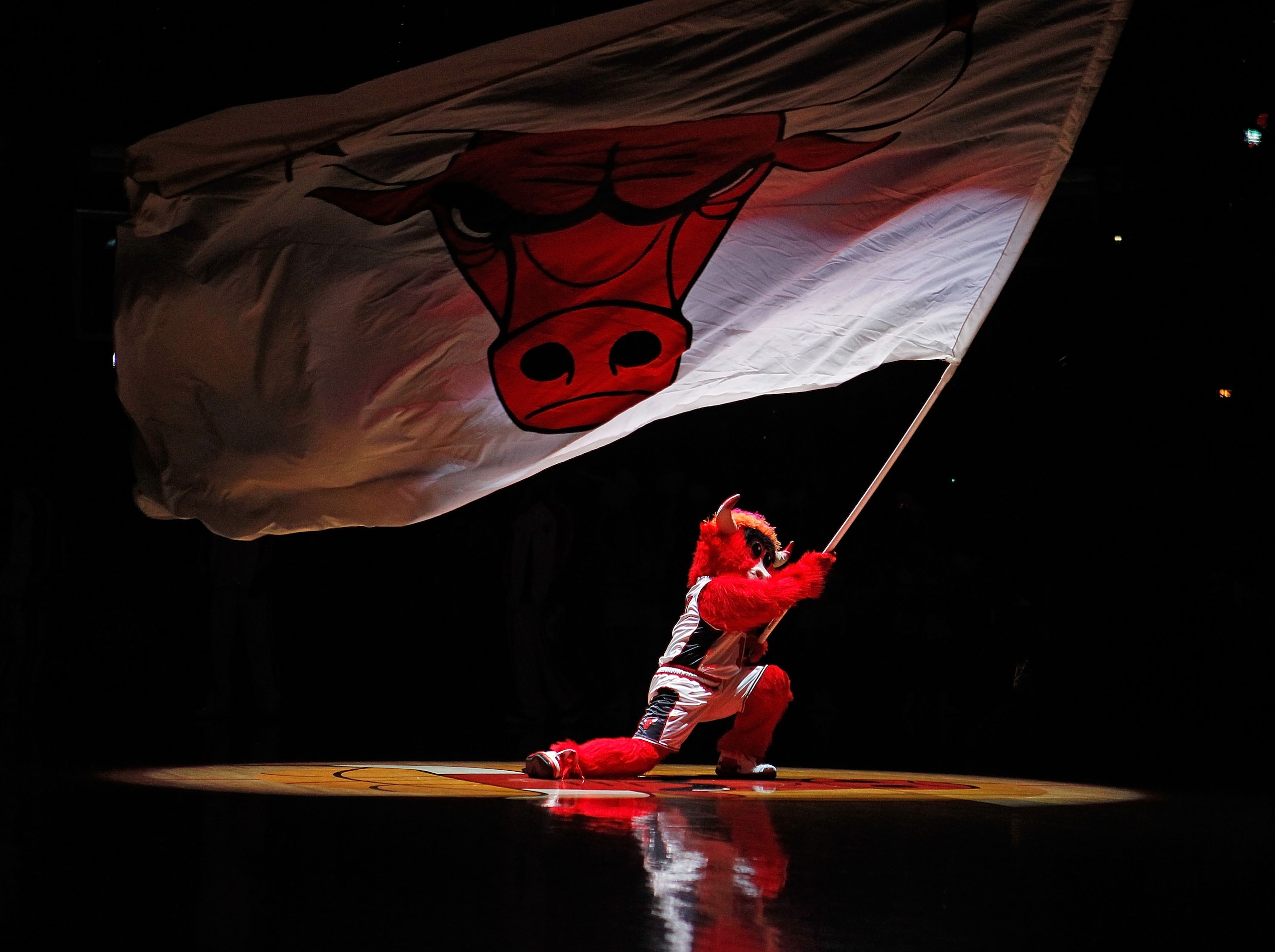 CHICAGO - MARCH 01: Benny, mascot of the Chicago Bulls, waves a flag during player introductions before a game between the Bulls and the Atlanta Hawks at the United Center on March 1, 2010 in Chicago, Illinois. NOTE TO USER: User expressly acknowledges an