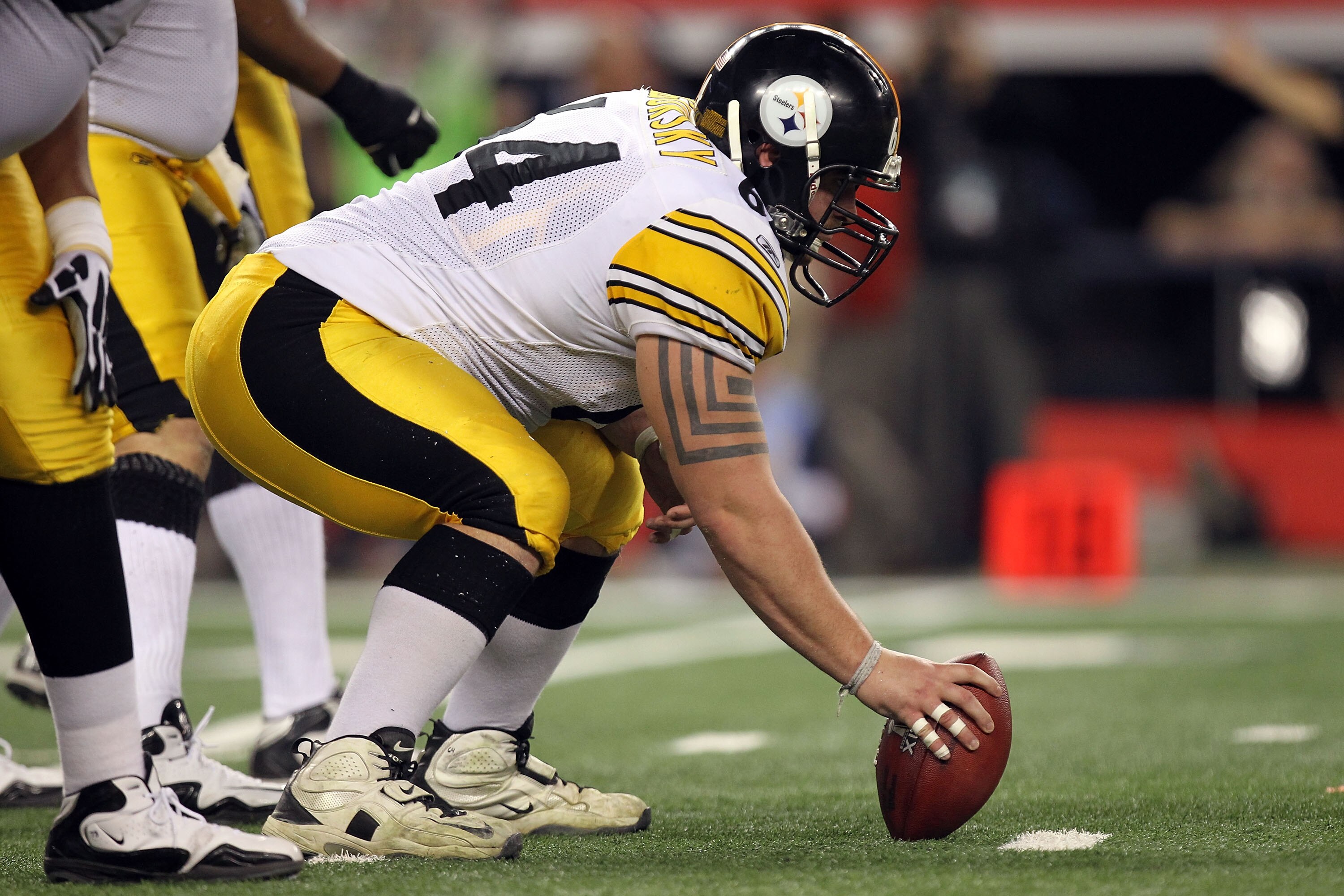 ARLINGTON, TX - FEBRUARY 06:  Doug Legursky #64 of the Pittsburgh Steelers prepares to snap against the Green Bay Packers during Super Bowl XLV at Cowboys Stadium on February 6, 2011 in Arlington, Texas.  (Photo by Ronald Martinez/Getty Images)