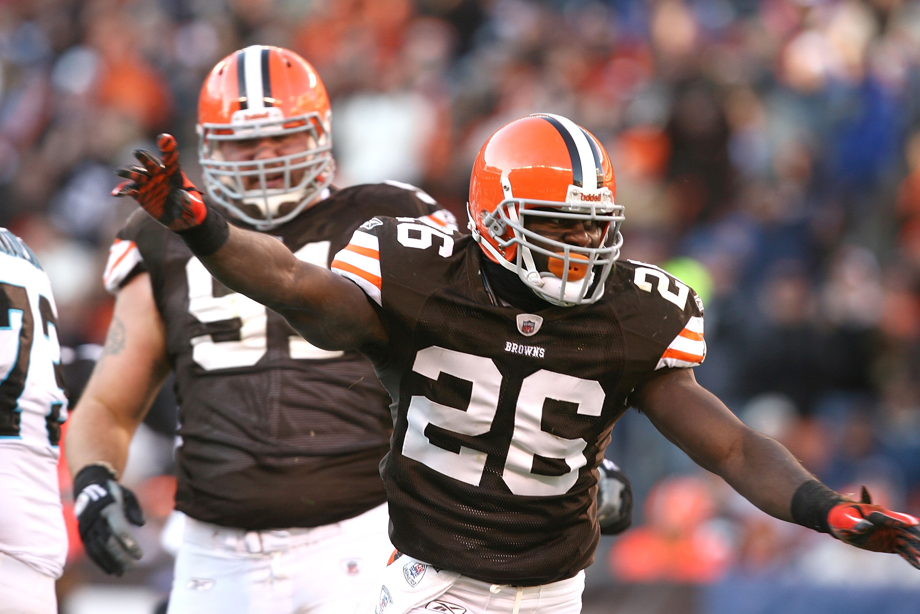 CLEVELAND - NOVEMBER 28:  Defensive players Abram Elam #26 and Brian Schaefering #91 of the Cleveland Browns celebrate after their game against the Carolina Panthers at Cleveland Browns Stadium on November 28, 2010 in Cleveland, Ohio.  (Photo by Matt Sull
