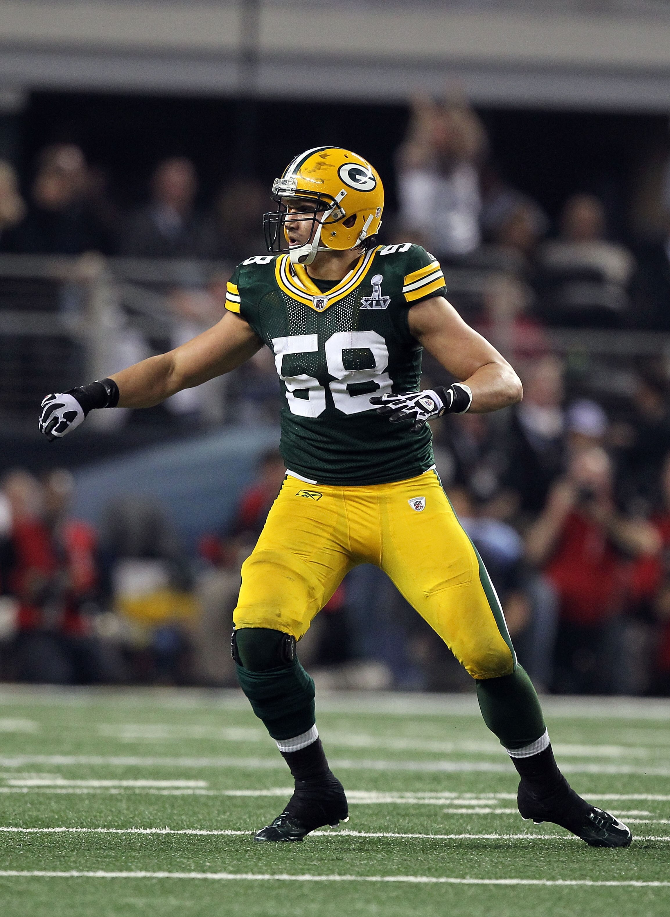 ARLINGTON, TX - FEBRUARY 06:  Frank Zombo #58 of the Green Bay Packers celebrates after sacking Ben Roethlisberger #7 of the Pittsburgh Steelers during Super Bowl XLV at Cowboys Stadium on February 6, 2011 in Arlington, Texas. Packers won 31-25.  (Photo b
