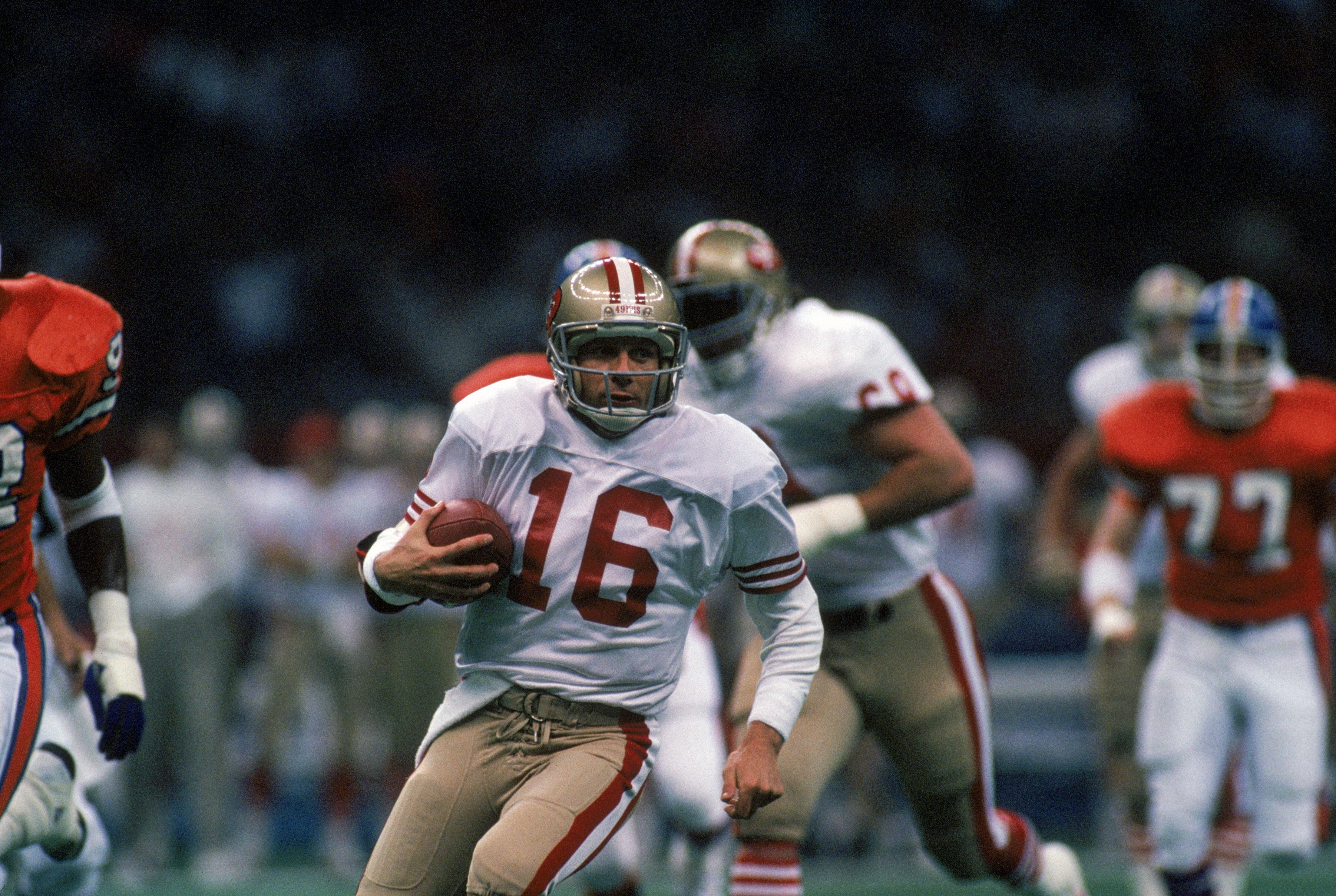 NEW ORLEANS - JANUARY 28:  Quarterback Joe Montana #16 of the San Francisco 49ers runs with the ball in Super Bowl XXIV against the Denver Broncos at Louisiana Superdome on January 28, 1990 in New Orleans, Louisiana.  The 49ers won 55-10.  (Photo by Georg