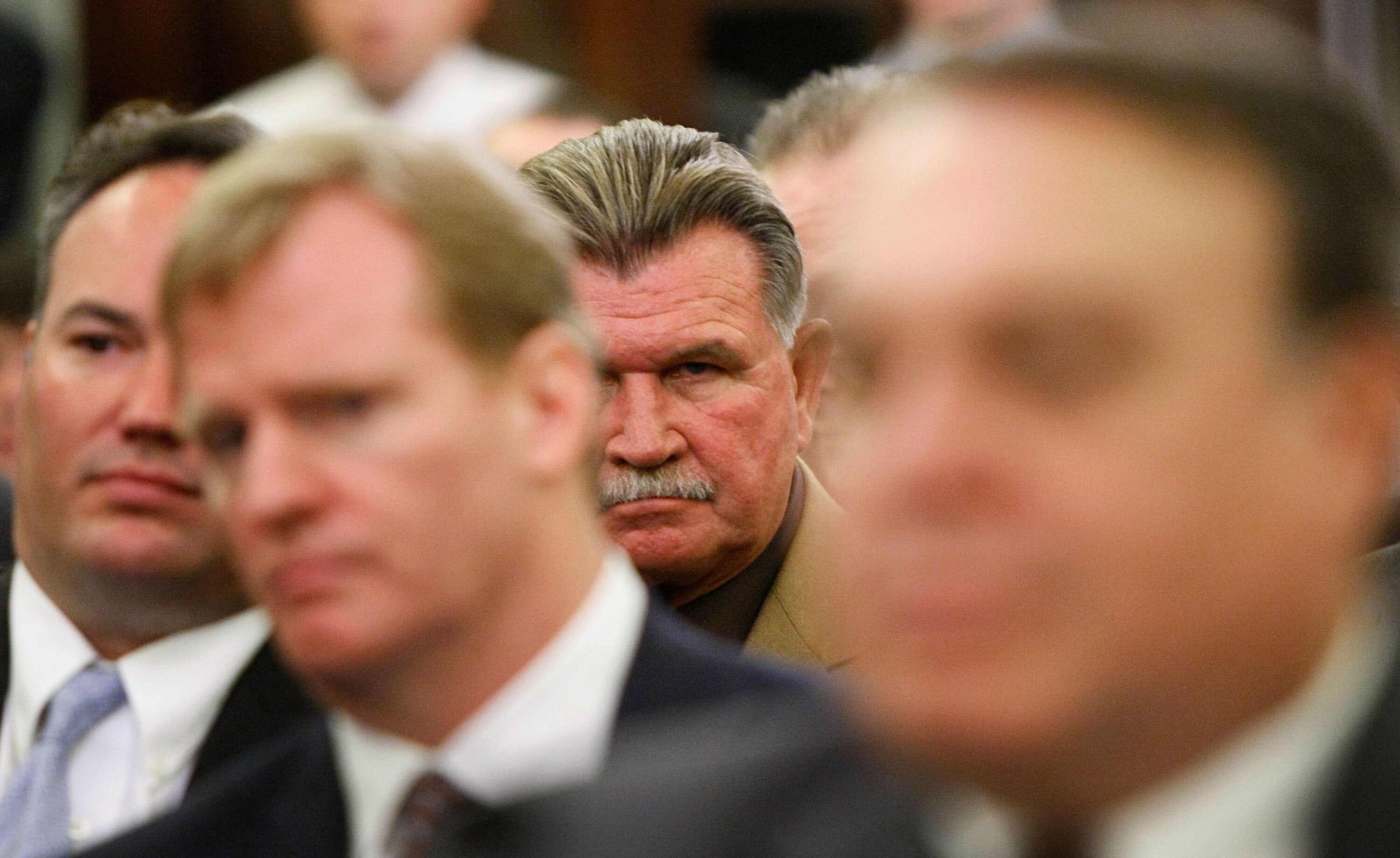 WASHINGTON - SEPTEMBER 18:  Pro Football Hall of Fame player and Coach Mike Ditka (2nd R) listens to testimony during a hearing of the Senate Commerce, Science and Transportation Committee on Capitol Hill September 18, 2007 in Washington, DC with NFL Comm