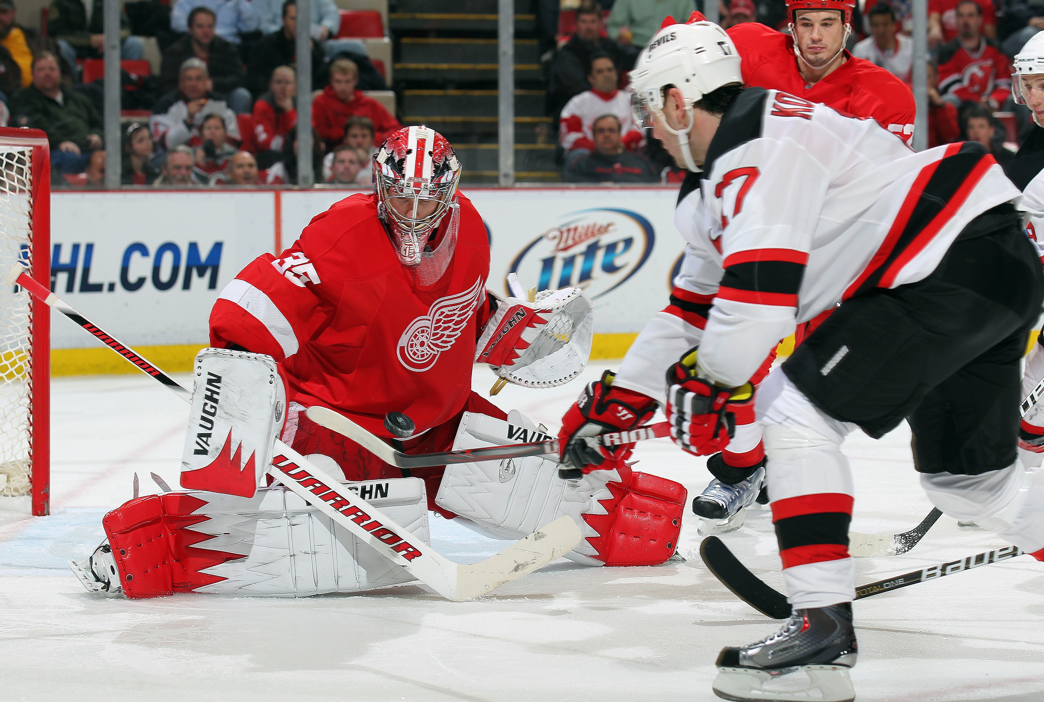 DETROIT, MI - JANUARY 26:  Ilya Kovalchuk #17 of the New Jersey Devils is stopped by Jimmy Howard #35 of the Detroit Red Wings in a game on January 26, 2011 at the Joe Louis Arena in Detroit, Michigan. The Wings defeated the Devils 3-1. (Photo by Claus An