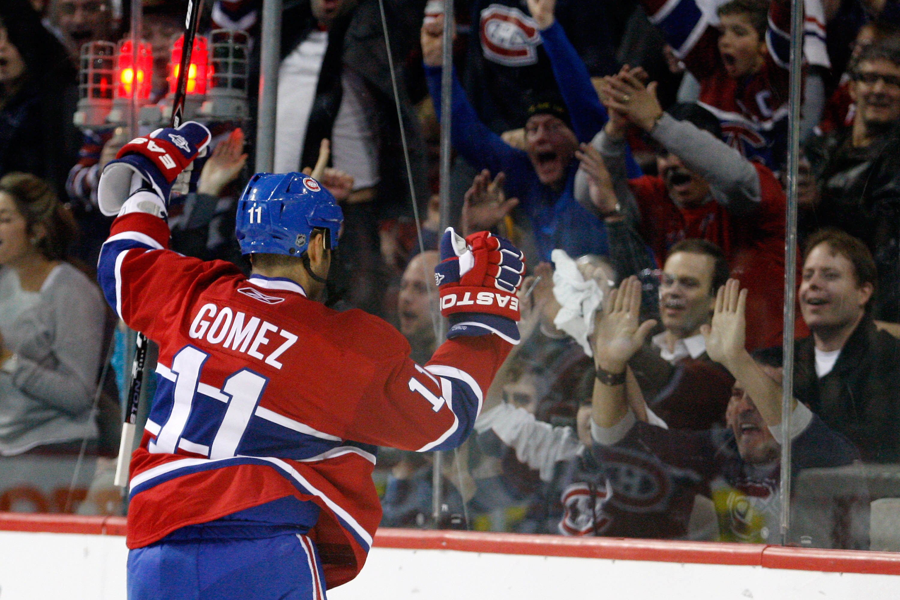 MONTREAL, CANADA - FEBRUARY 5:  Scott Gomez #11 of the Montreal Canadiens celebrates his second period goal during the NHL game against the New York Rangers at the Bell Centre on February 5, 2011 in Montreal, Quebec, Canada.  (Photo by Richard Wolowicz/Ge