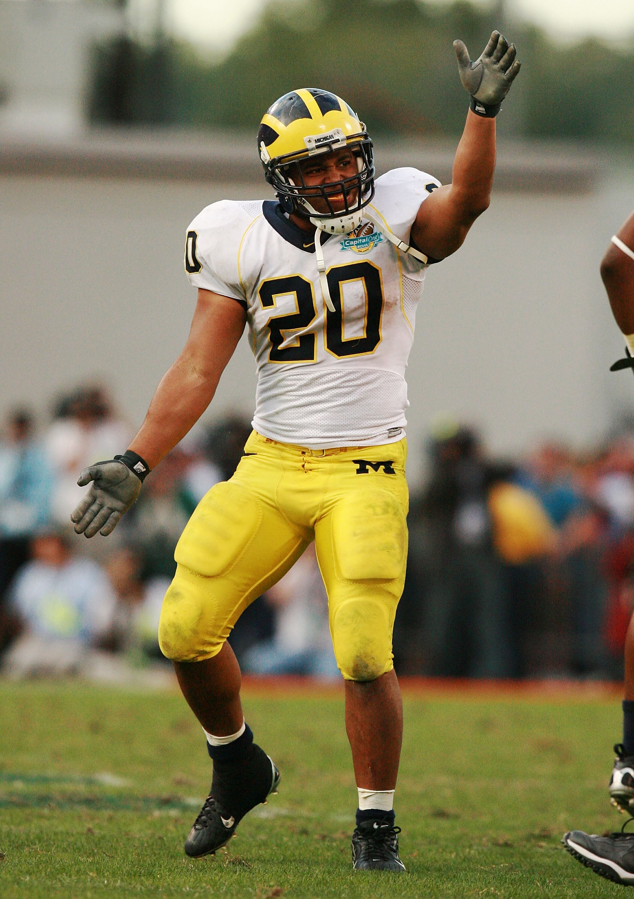 ORLANDO, FL - JANUARY 01:  Running Mike Hart #20 of the Michigan Wolverines celebrates after an incomplete pass ended the final offensive series of the Florida Gators in the Capital One Bowl at Florida Citrus Bowl on January 1, 2008 in Orlando, Florida. M