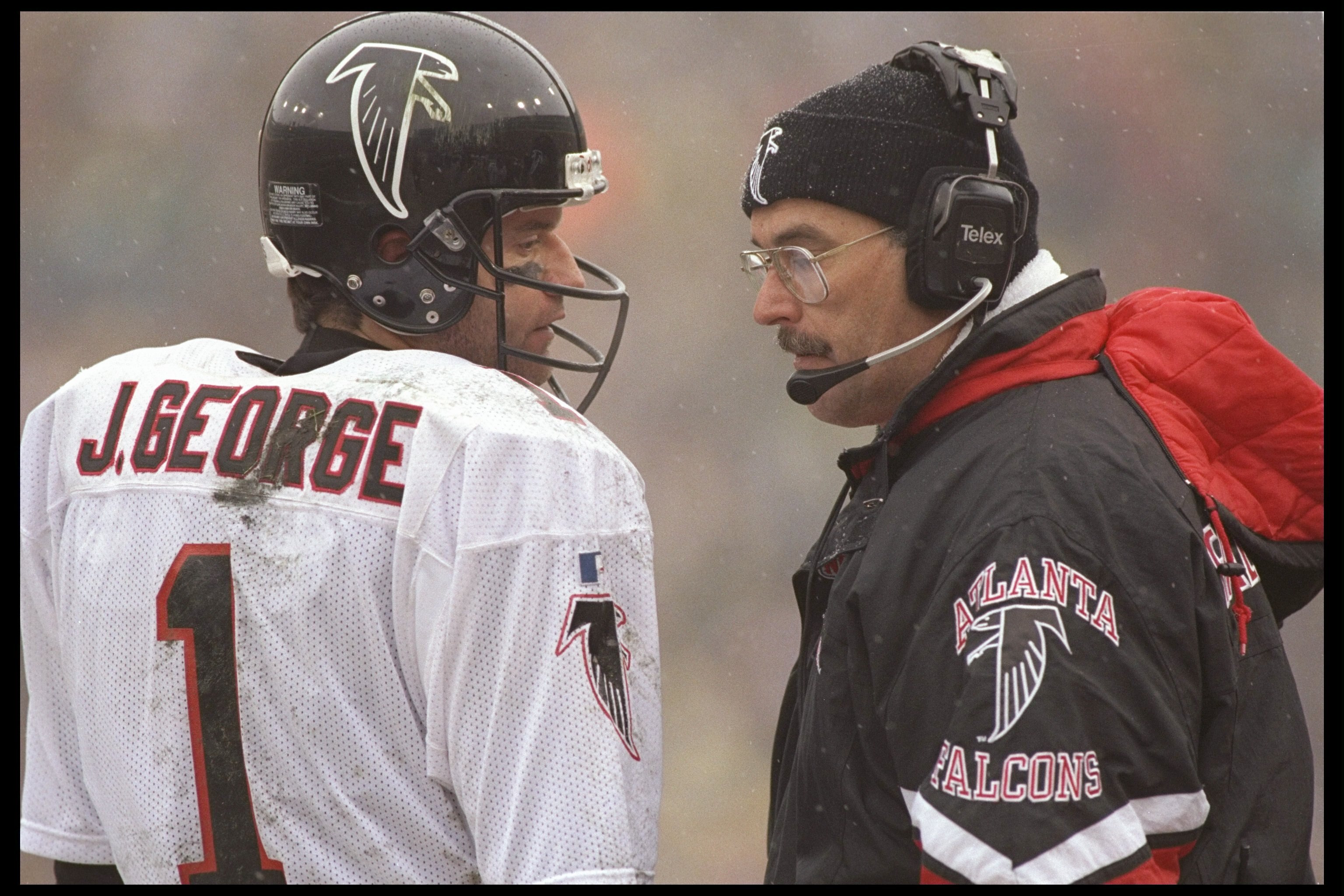 31 Dec 1995:  Quarterback Jeff George speaks with coach June Jones of the Atlanta Falcons during a game against the Green Bay Packers at Lambeau Field in Green Bay, Wisconsin.  The Packers won the game 37-20. Mandatory Credit: Jed Jacobsohn  /Allsport