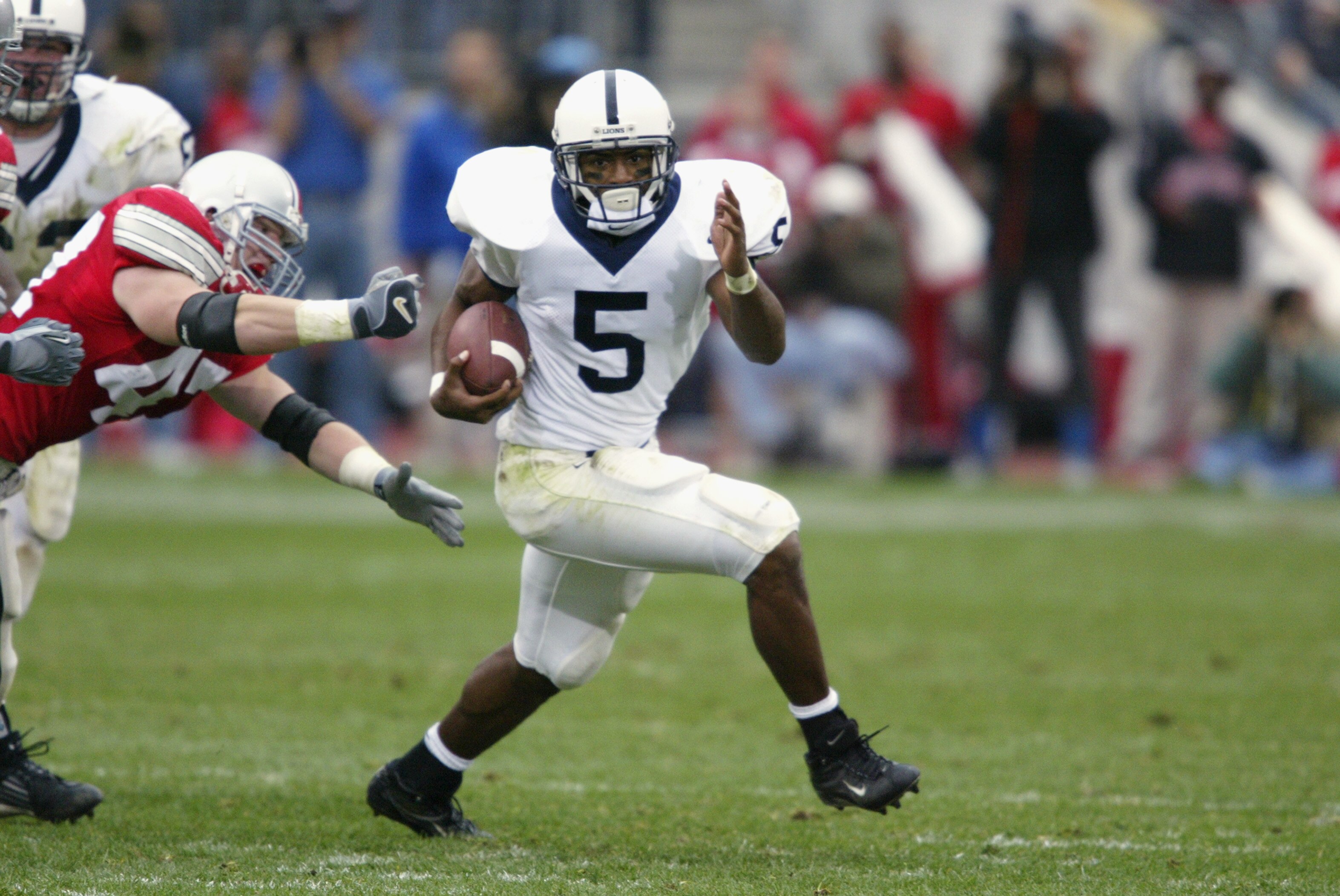 COLUMBUS - OCTOBER 26:  Penn State tailback Larry Johnson #5 rushes during the NCAA football game against Ohio State at Ohio Stadium on October 26, 2002 in Columbus, Ohio.  The Ohio State Buckeyes defeated the Penn State Nittany Lions in a closely fought