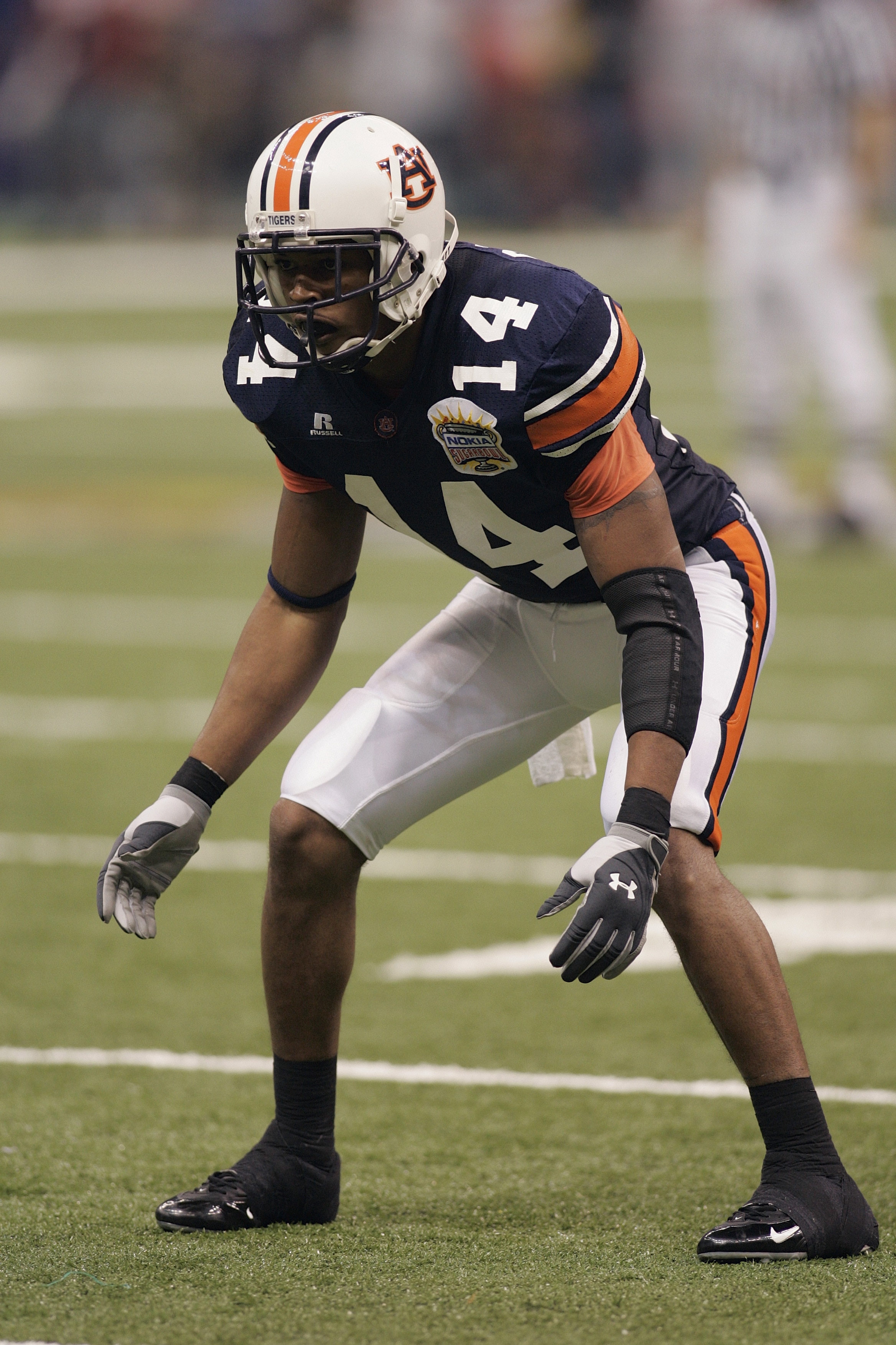 NEW ORLEANS - JANUARY 3:  Defensive back Carlos Rogers #14 of the Auburn Tigers looks on while facing the Virginia Tech Hokies during the Nokia Sugar Bowl on January 3, 2005 at the Superdome in New Orleans, Louisiana.  Auburn defeated Virginia Tech 16-13.