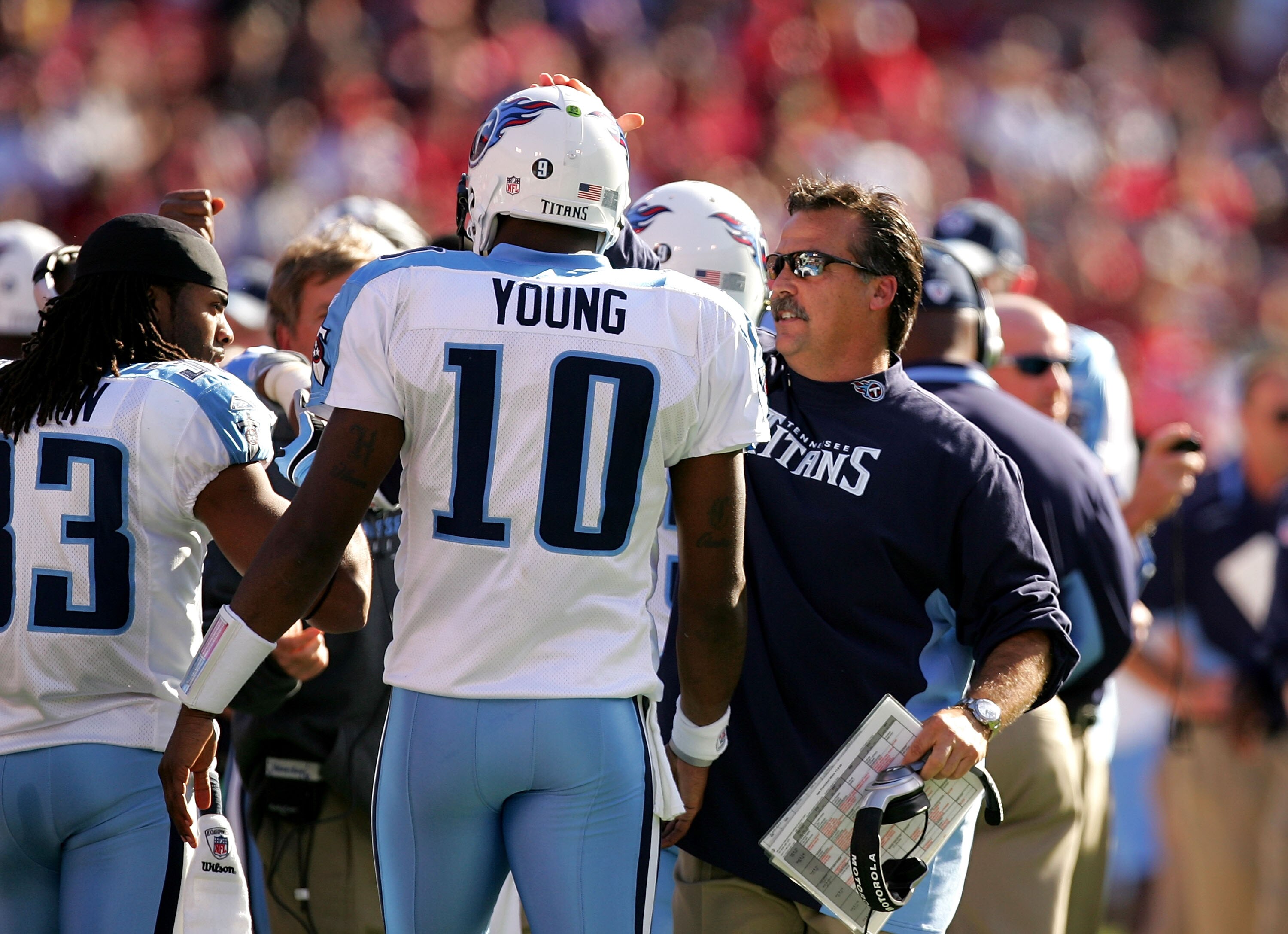 SAN FRANCISCO - NOVEMBER 08:  Head coach Jeff Fisher of the Tennessee Titans congratulates Vince Young #10 after Young ran in for a touchdown against the San Francisco 49ers at Candlestick Park on November 8, 2009 in San Francisco, California.  (Photo by