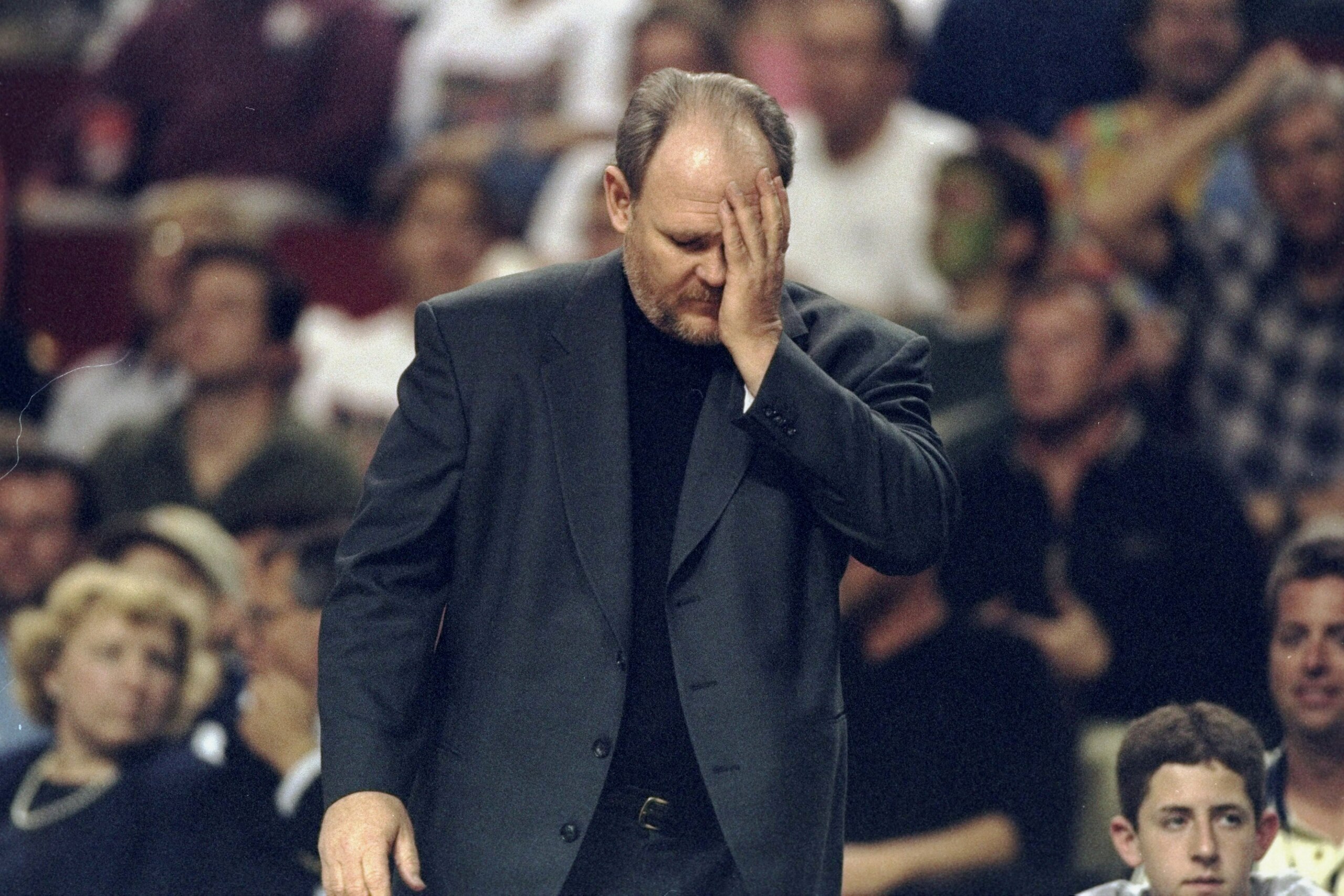 4 May 1998: Seattle SuperSonics head coach George Karl looks down in disbelief during game one of the second round of the Western Conference Playoffs against the Los Angeles Lakers at the Key Arena in Seattle, Washington. The SuperSonics defeated the Lak 4 May 1998: Seattle SuperSonics head coach George Karl looks down in disbelief during game one of the second round of the Western Conference Playoffs against the Los Angeles Lakers at the Key Arena in Seattle, Washington. The SuperSonics defeated the Lak