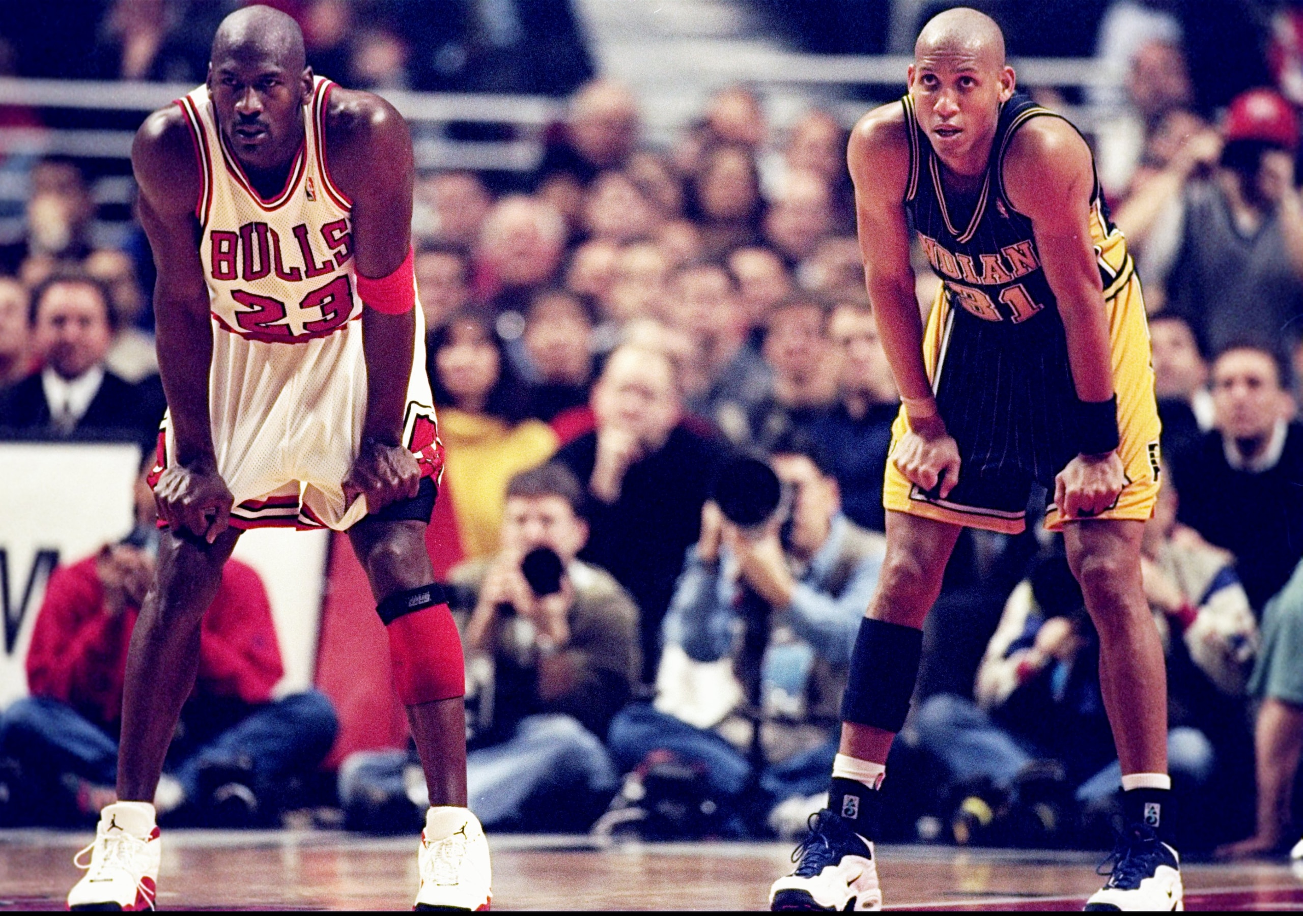 17 Feb 1998: Guard Michael Jordan of the Chicago Bulls (left) in action against guard Reggie Miller of the Indiana Pacers. The Bulls defeated the Pacers 105-97. Mandatory Credit: Jonathan Daniel /Allsport 17 Feb 1998: Guard Michael Jordan of the Chicago Bulls (left) in action against guard Reggie Miller of the Indiana Pacers. The Bulls defeated the Pacers 105-97. Mandatory Credit: Jonathan Daniel /Allsport