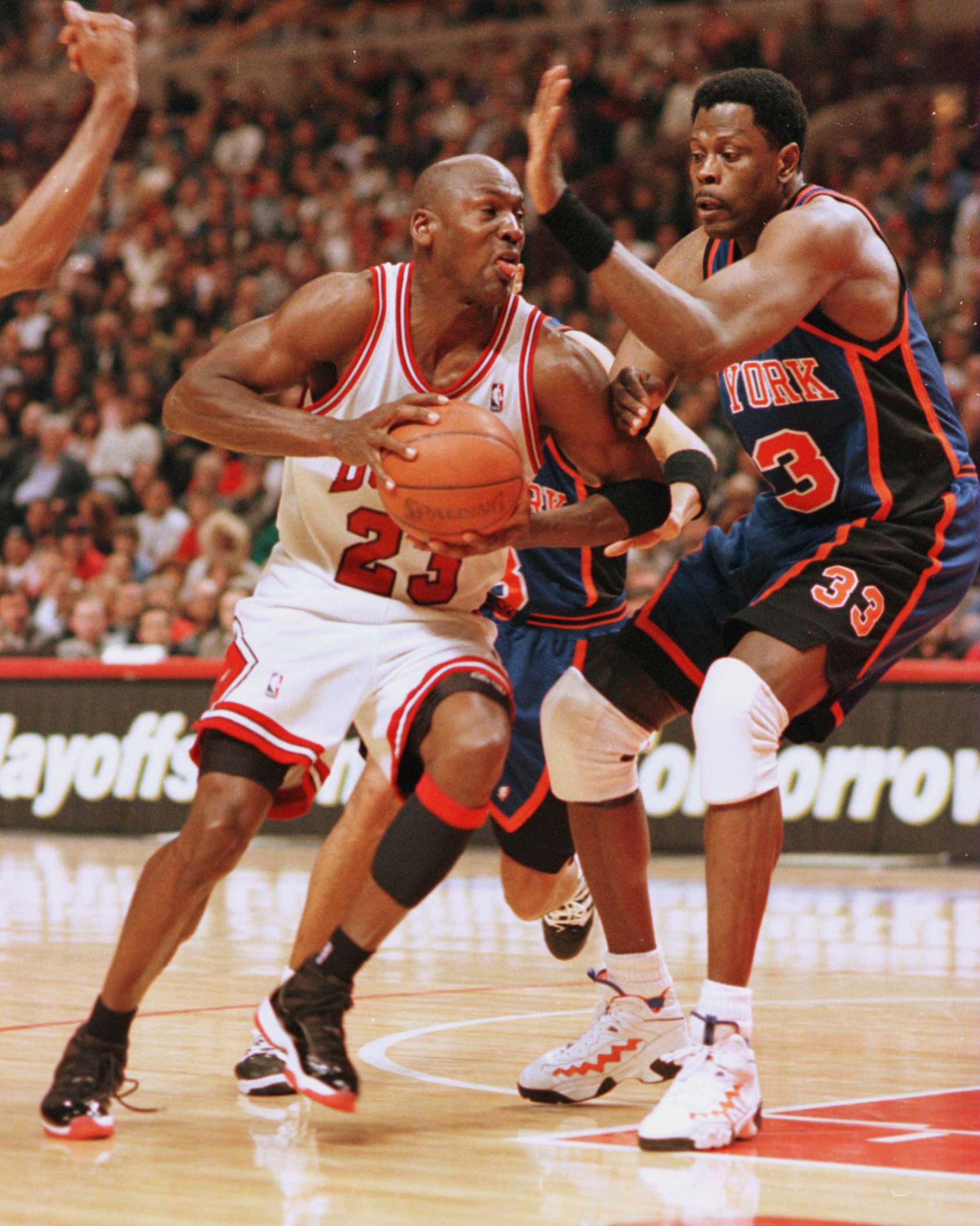7 May 1996: Michael Jordan of the Chicago Bulls drives around Patrick Ewing of the New York Knicks during second half action of their Eastern Conference NBA play-off semifinals at the United Center in Chicago, Illinois. The Bulls went on to beat the Kni 7 May 1996: Michael Jordan of the Chicago Bulls drives around Patrick Ewing of the New York Knicks during second half action of their Eastern Conference NBA play-off semifinals at the United Center in Chicago, Illinois. The Bulls went on to beat the Kni