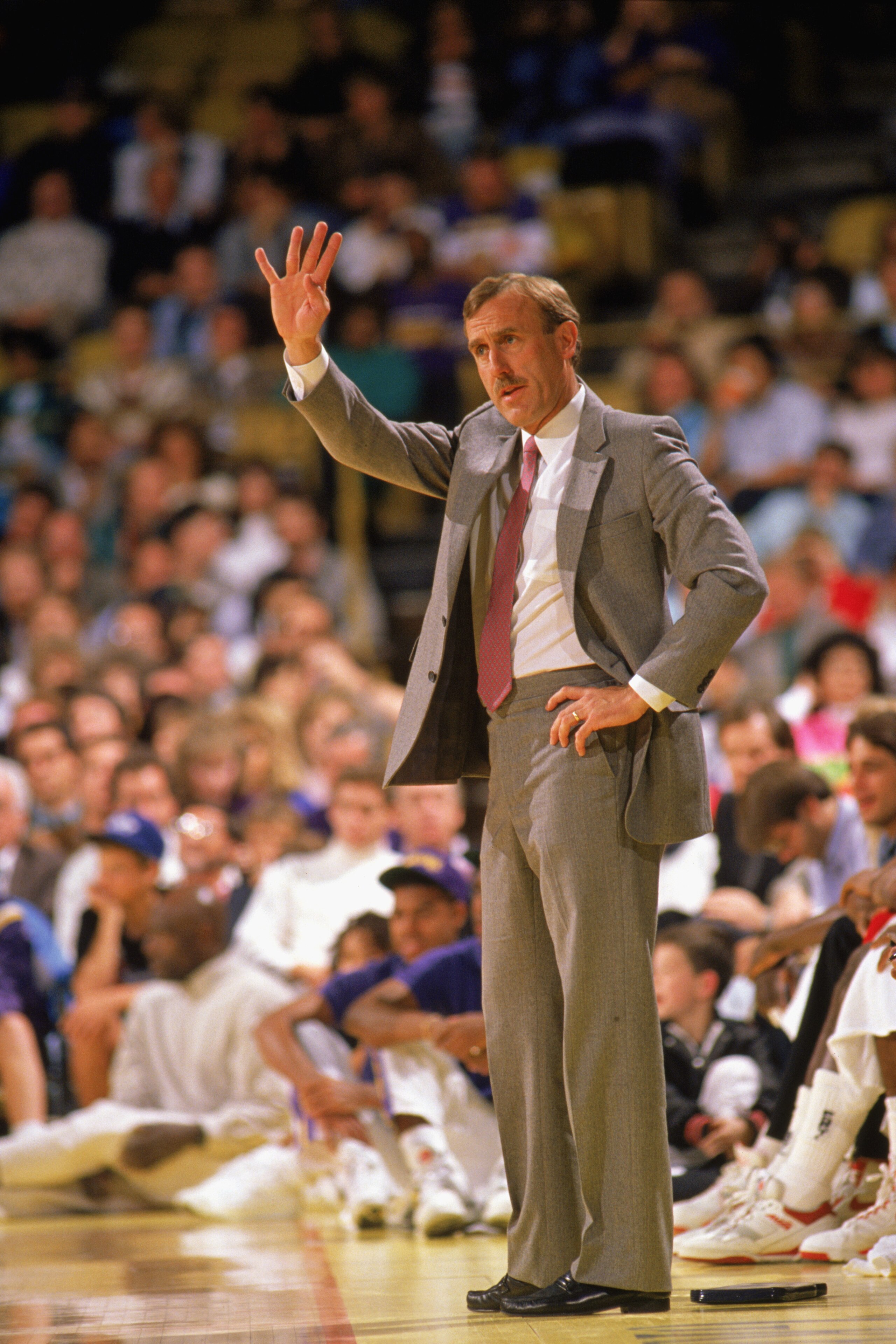 LOS ANGELES - 1990: Head coach Rick Adelman of the Portland Trail Blazers reacts to the 1989-1990 NBA season game against the Los Angeles Lakers at the Great Western Forum in Los Angeles, California against the Los Angeles Lakers at the Great Western For LOS ANGELES - 1990: Head coach Rick Adelman of the Portland Trail Blazers reacts to the 1989-1990 NBA season game against the Los Angeles Lakers at the Great Western Forum in Los Angeles, California against the Los Angeles Lakers at the Great Western For
