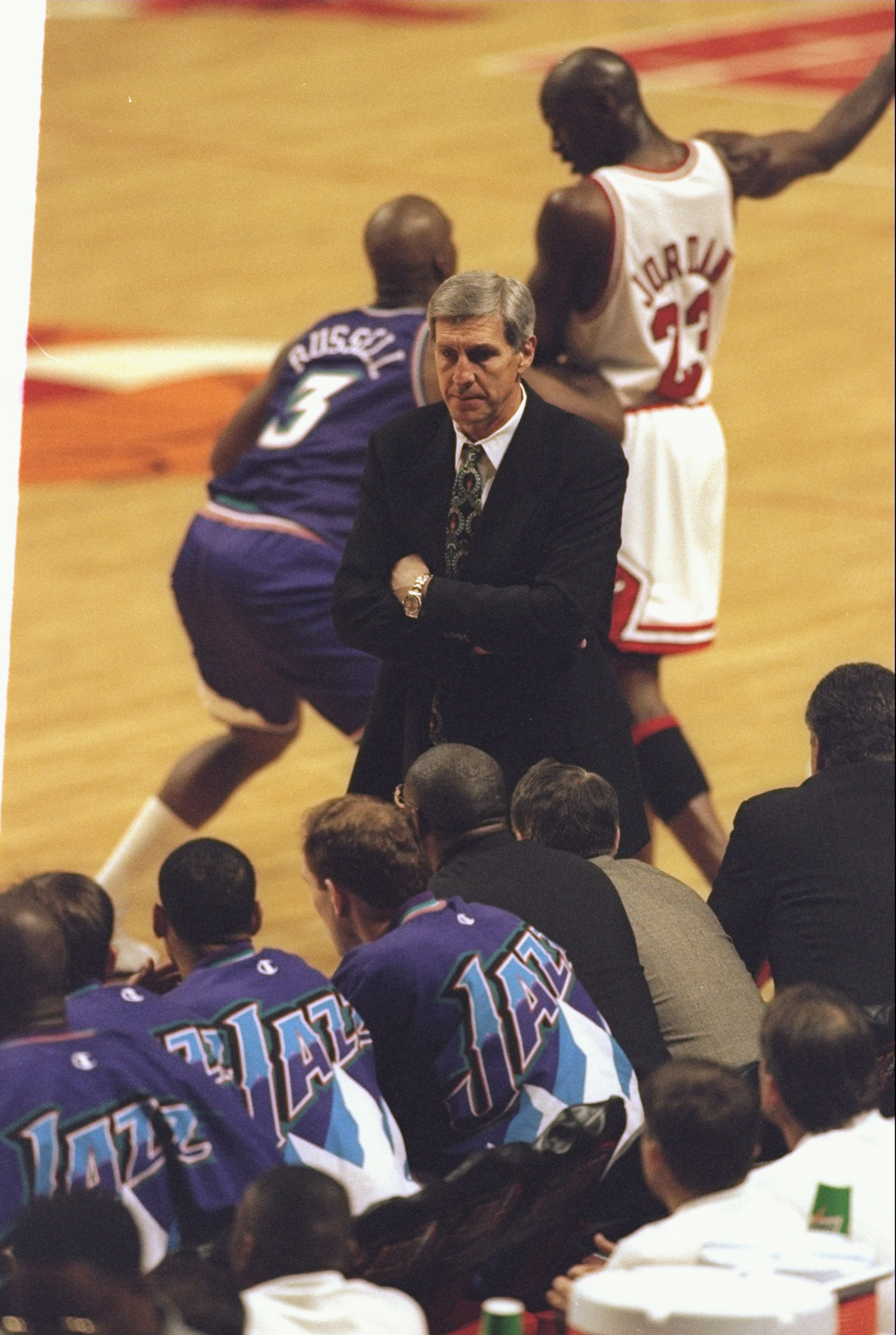 7 Jun 1998: Head Coach Jerry Sloan of the Utah Jazz looks at his team as Michael Jordan #23 of the Chicago Bulls keeps the ball away from Bryon Russell #3 of the Jazz during the NBA Finals game 3 at the United Center in Chicago, Illinois. The Bulls defe 7 Jun 1998: Head Coach Jerry Sloan of the Utah Jazz looks at his team as Michael Jordan #23 of the Chicago Bulls keeps the ball away from Bryon Russell #3 of the Jazz during the NBA Finals game 3 at the United Center in Chicago, Illinois. The Bulls defe