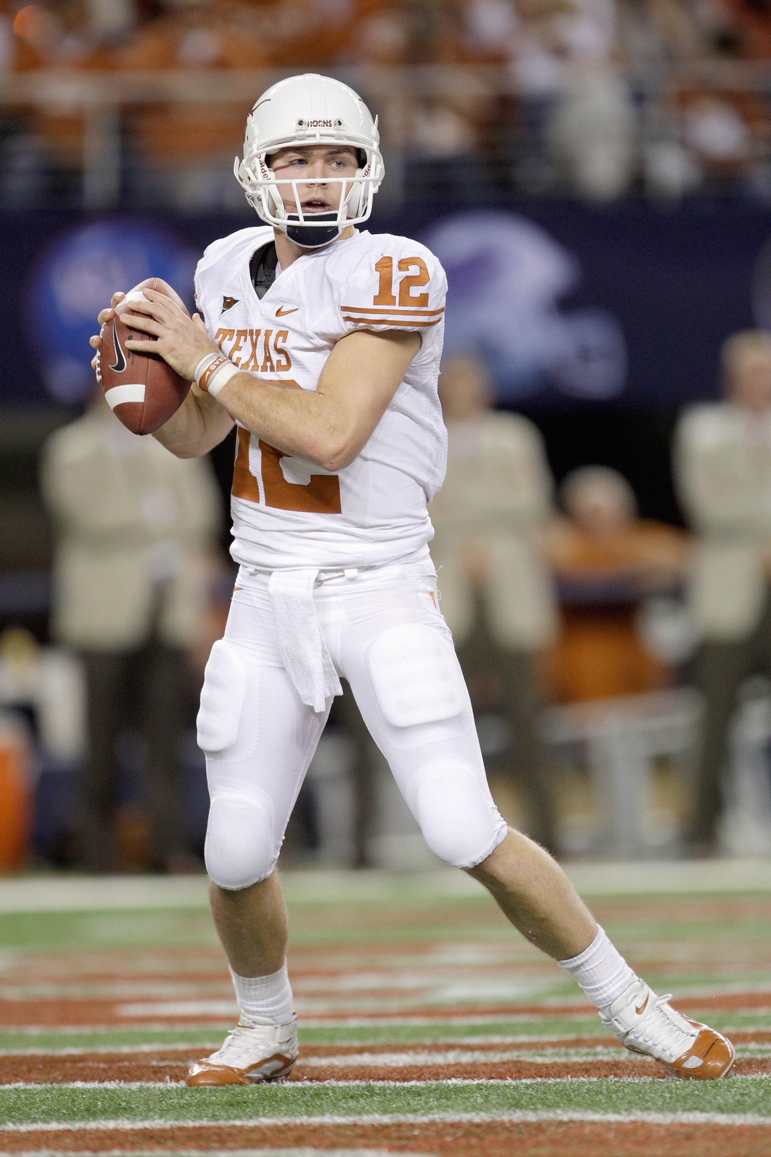ARLINGTON, TX - DECEMBER 5: Colt McCoy #12 of the Texas Longhorns looks to pass the ball during the Big 12 Football Championship game against the Nebraska Cornhuskers at Cowboys Stadium on December 5, 2009 in Arlington, Texas. (Photo by Jamie Squire/Getty