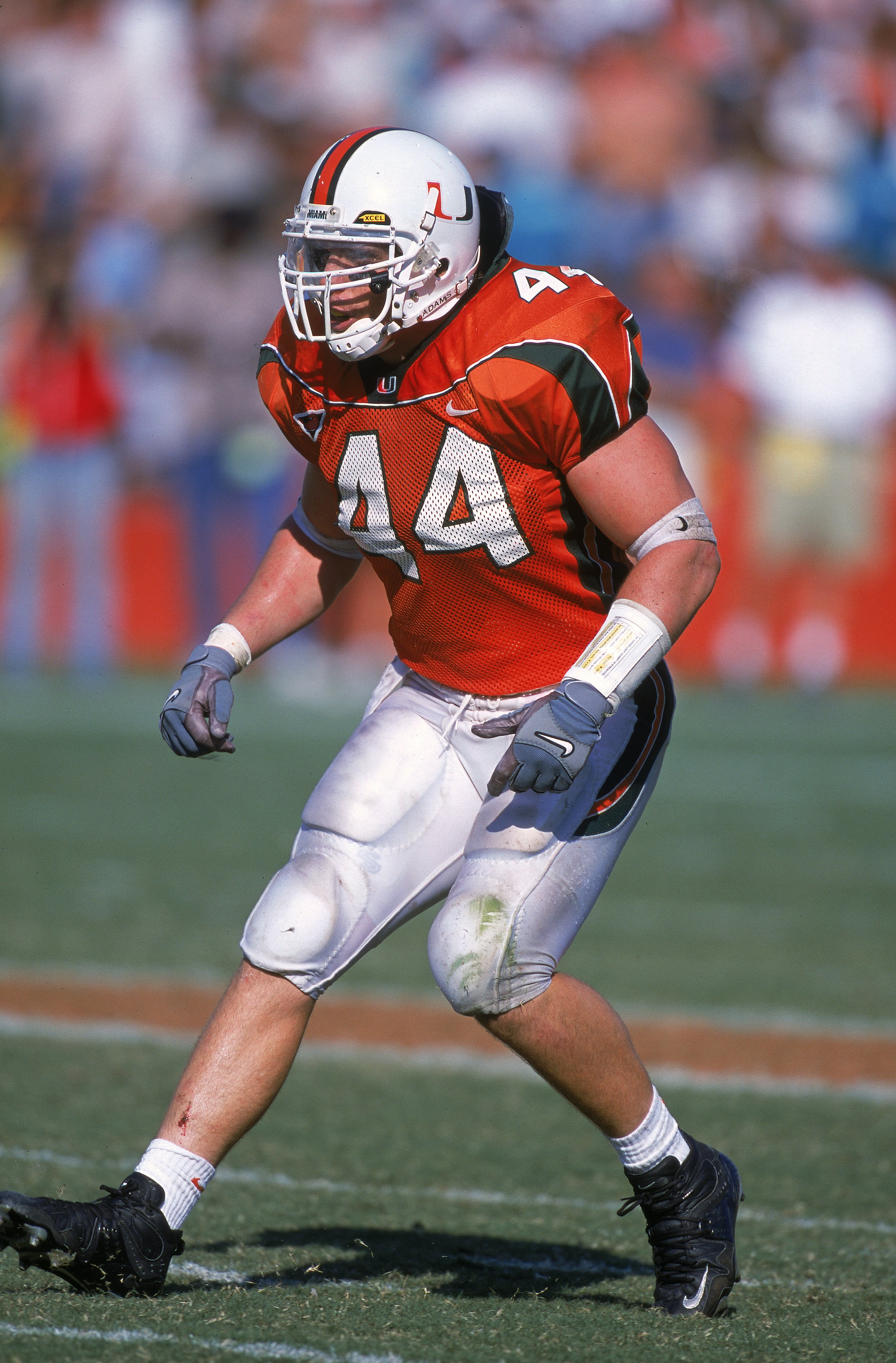 4 Nov 2000: Dan Morgan #44 of the Miami Hurricanes moves in to position during the game against the Virginia Tech Hokies at the Orange Bowl in Miami, Florida. The Hurricanes defeated the Hokies 41-21.Mandatory Credit: Scott Halleran  /Allsport