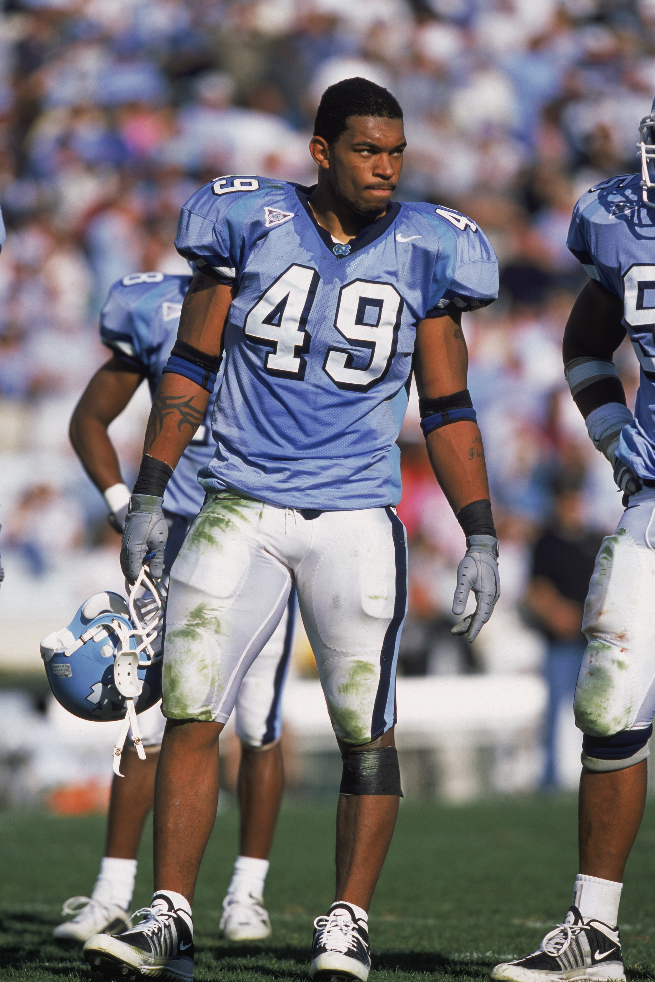 10 Nov 2001: Defensive End Julius Peppers #49 of the North Carolina (UNC) Tar Heels holding hishelmet while standing on the field during the game against the Wake Forest Demon Deacons at the Kenan Stadium in Chapel Hill, North Carolina. The Demon Deacons 10 Nov 2001: Defensive End Julius Peppers #49 of the North Carolina (UNC) Tar Heels holding hishelmet while standing on the field during the game against the Wake Forest Demon Deacons at the Kenan Stadium in Chapel Hill, North Carolina. The Demon Deacons