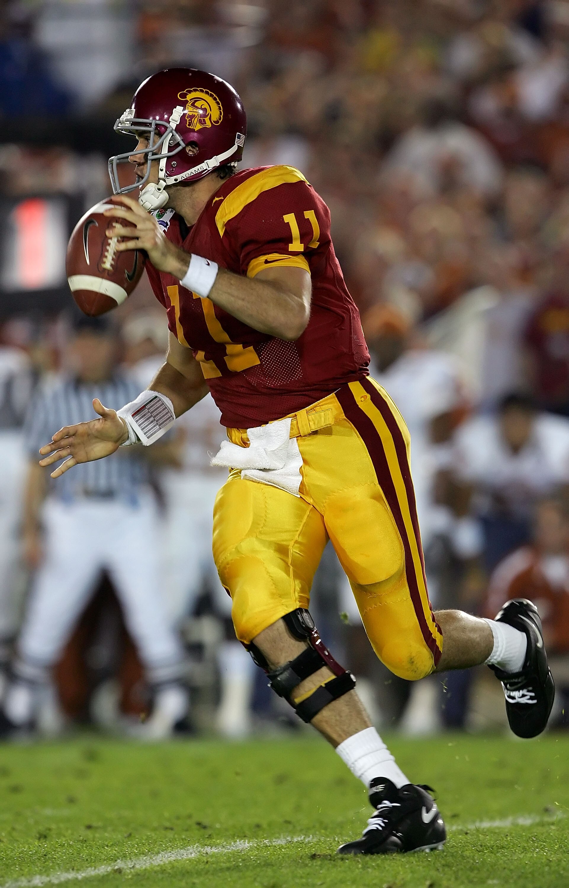 PASADENA, CA - JANUARY 04:  Quarterback Matt Leinart #11 of the USC Trojans looks for an open pass in the first half of the BCS National Championship Rose Bowl Game against the Texas Longhorns at the Rose Bowl on January 4, 2006 in Pasadena, California.