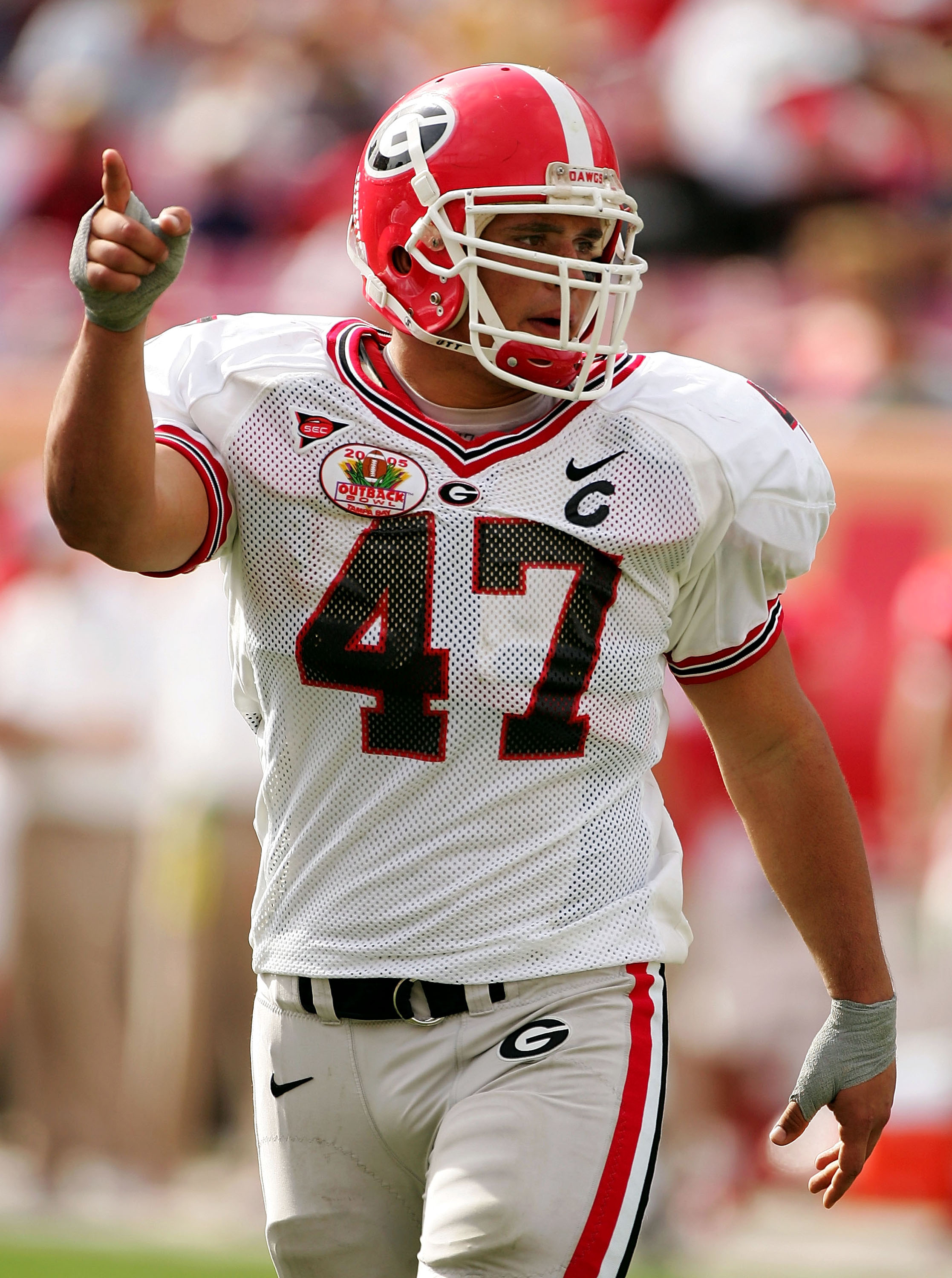 TAMPA, FL - JANUARY 1:  Georgia defender David Pollack #47 celebrates a play against Wisconsin during the second half of the Outback Bowl on January 1, 2005 at Raymond James Stadium in Tampa, Florida.  (Photo by Scott Halleran/Getty Images)