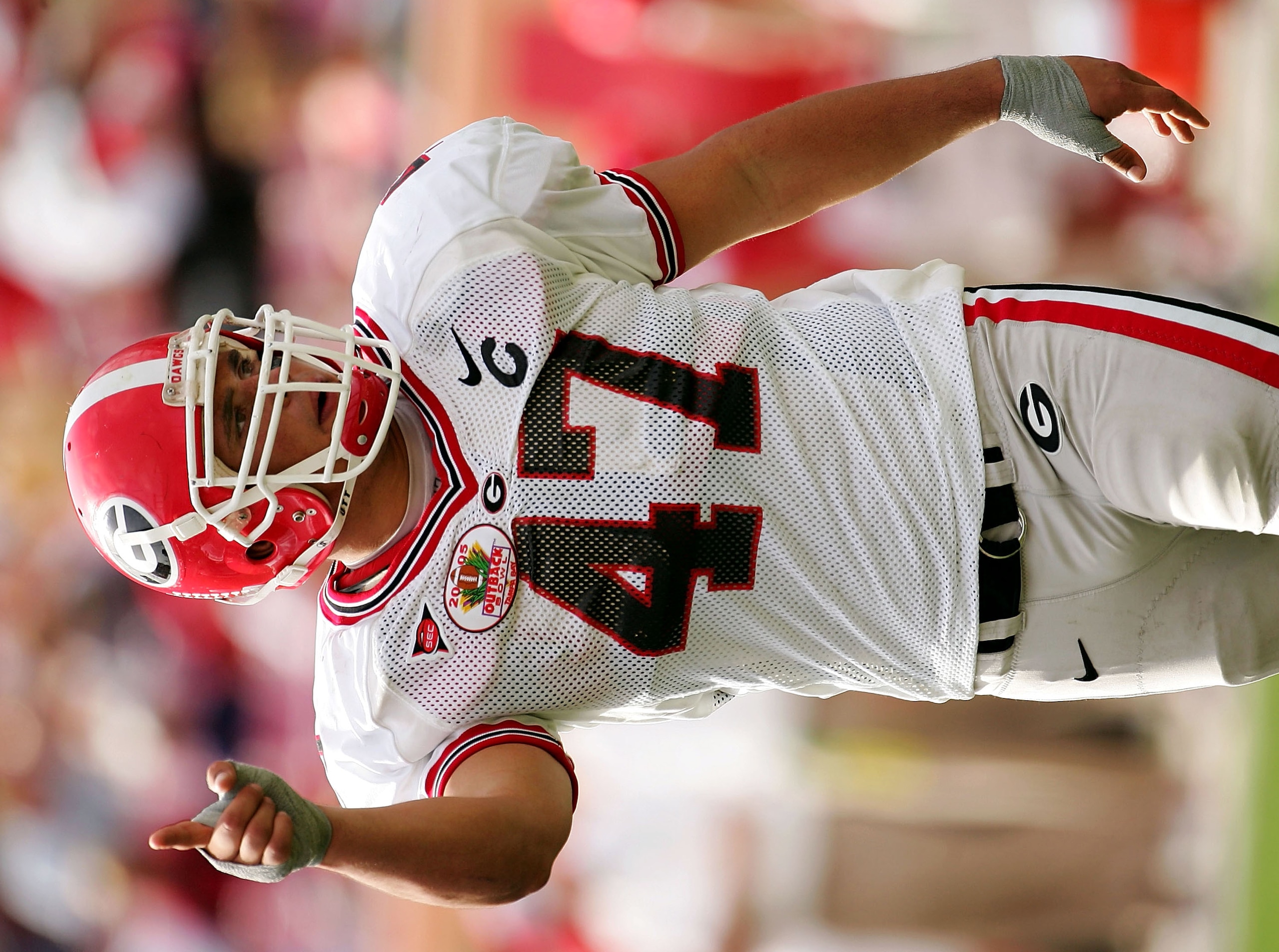TAMPA, FL - JANUARY 1: Georgia defender David Pollack #47 celebrates a play against Wisconsin during the second half of the Outback Bowl on January 1, 2005 at Raymond James Stadium in Tampa, Florida. (Photo by Scott Halleran/Getty Images) TAMPA, FL - JANUARY 1: Georgia defender David Pollack #47 celebrates a play against Wisconsin during the second half of the Outback Bowl on January 1, 2005 at Raymond James Stadium in Tampa, Florida. (Photo by Scott Halleran/Getty Images)