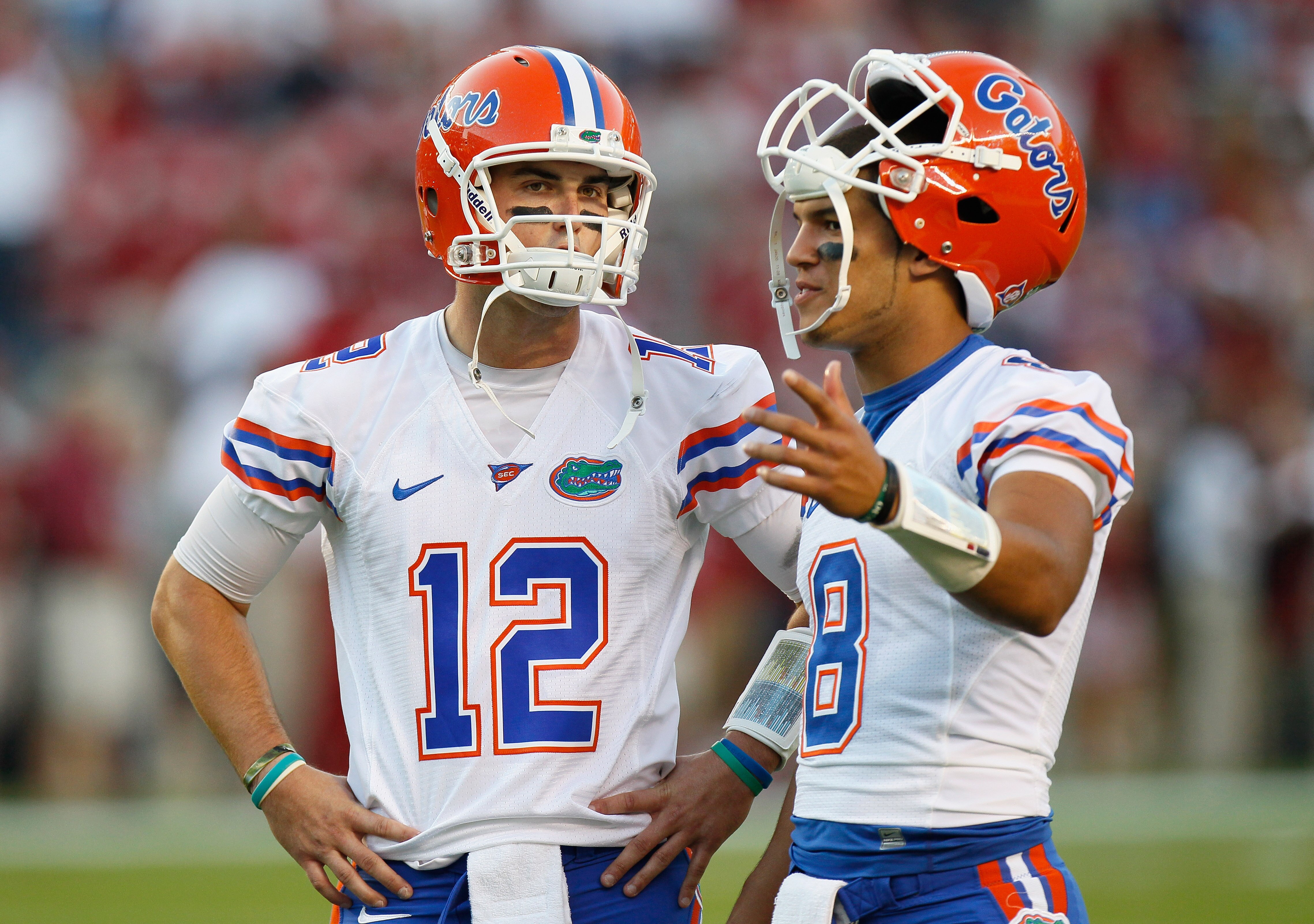 TUSCALOOSA, AL - OCTOBER 02:  Quarterbacks John Brantley #12 and Trey Burton #8 of the Florida Gators converse during pregame warmups before facing the Alabama Crimson Tide at Bryant-Denny Stadium on October 2, 2010 in Tuscaloosa, Alabama.  (Photo by Kevi
