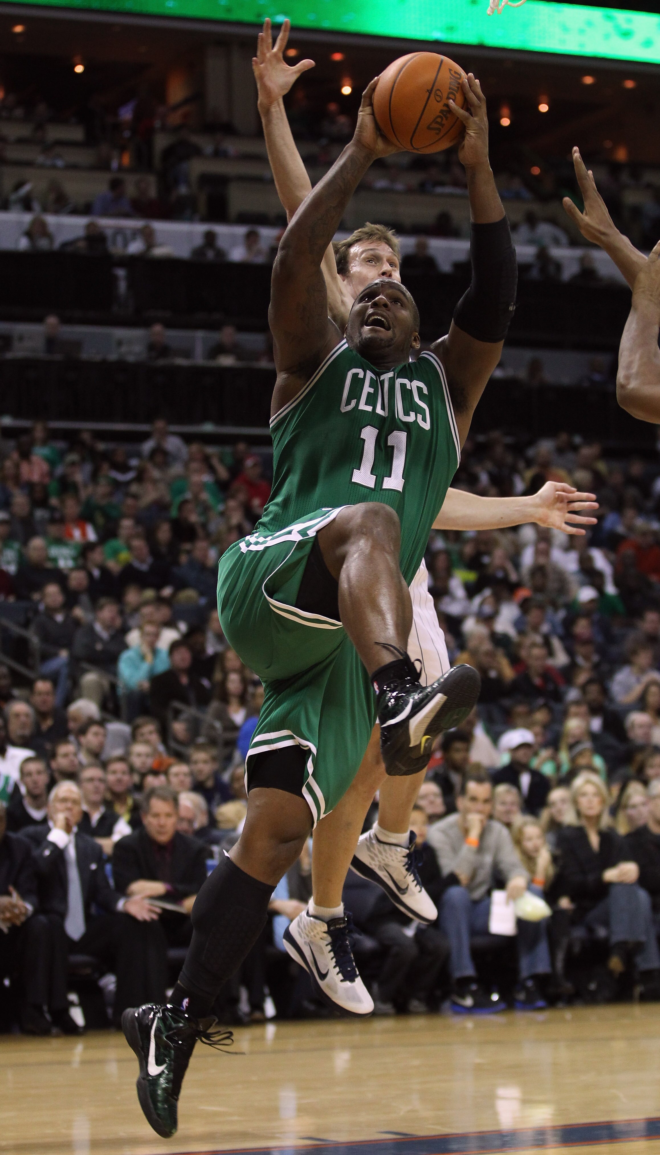 CHARLOTTE, NC - DECEMBER 11:  Glen Davis #11 of the Boston Celtics against the Charlotte Bobcats during their game at Time Warner Cable Arena on December 11, 2010 in Charlotte, North Carolina. NOTE TO USER: User expressly acknowledges and agrees that, by