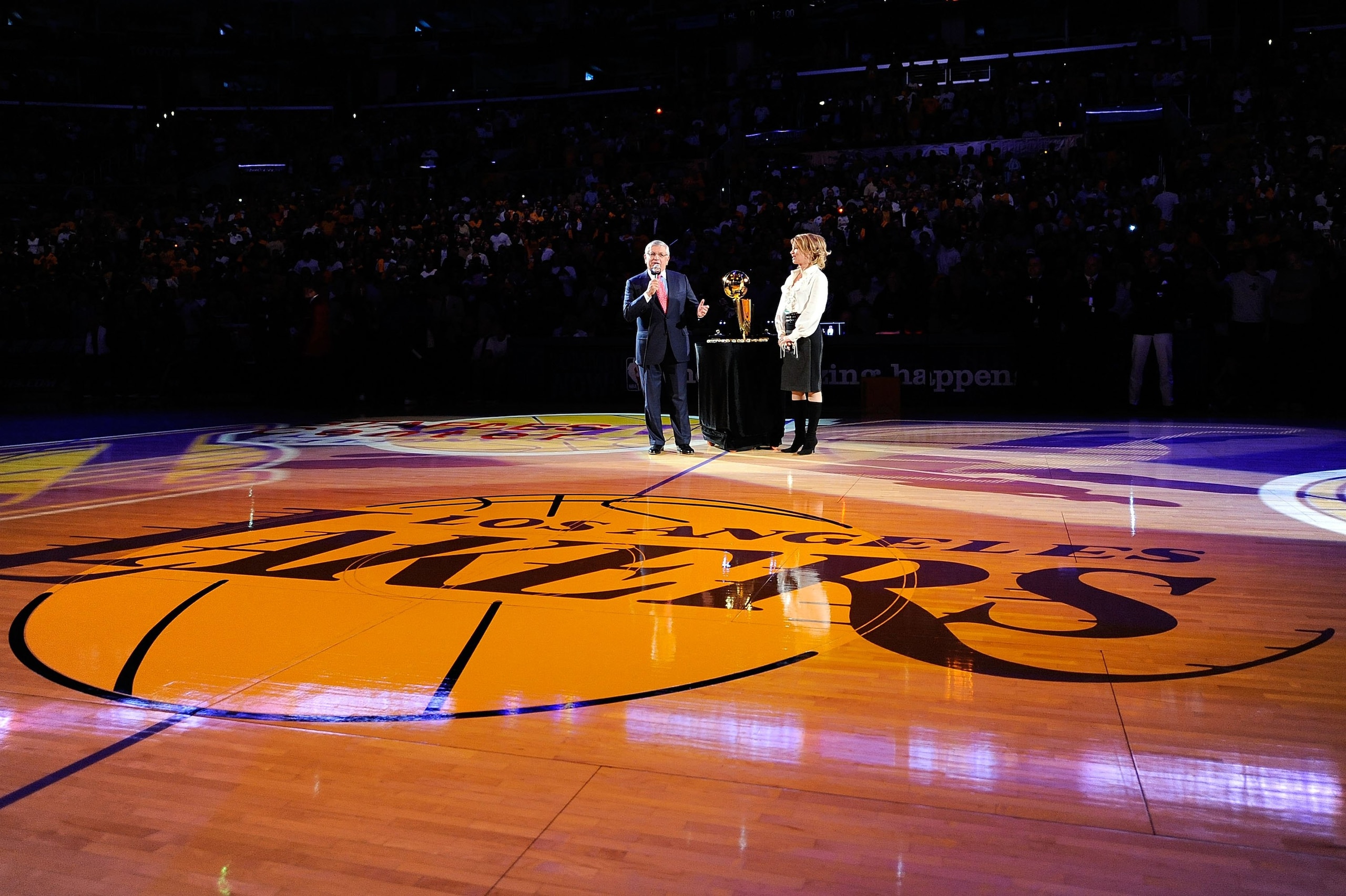 LOS ANGELES, CA - OCTOBER 27:  NBA Commissioner David Stern (L) and Los Angeles Lakers Executive Vice President of Business Operations Jeanie Buss address the crowd before presenting the Los Angeles Lakers with the 2009 NBA Championship rings before the s