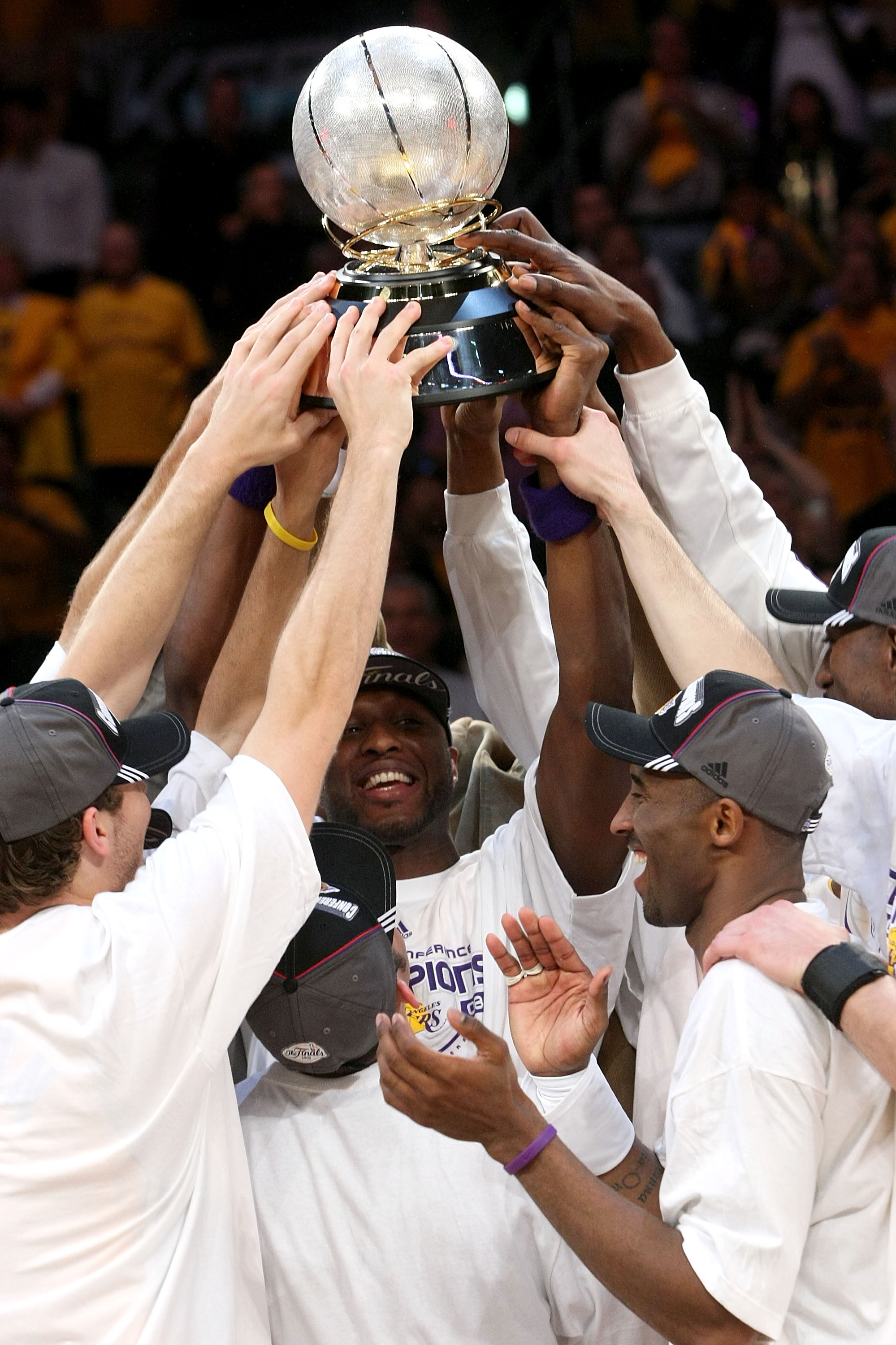 LOS ANGELES, CA - MAY 29:  The Los Angeles Lakers hold up at the Western Conference Championship trophy after they defeated the San Antonio Spurs in Game Five of the Western Conference Finals during the 2008 NBA Playoffs on May 29, 2008 at Staples Center