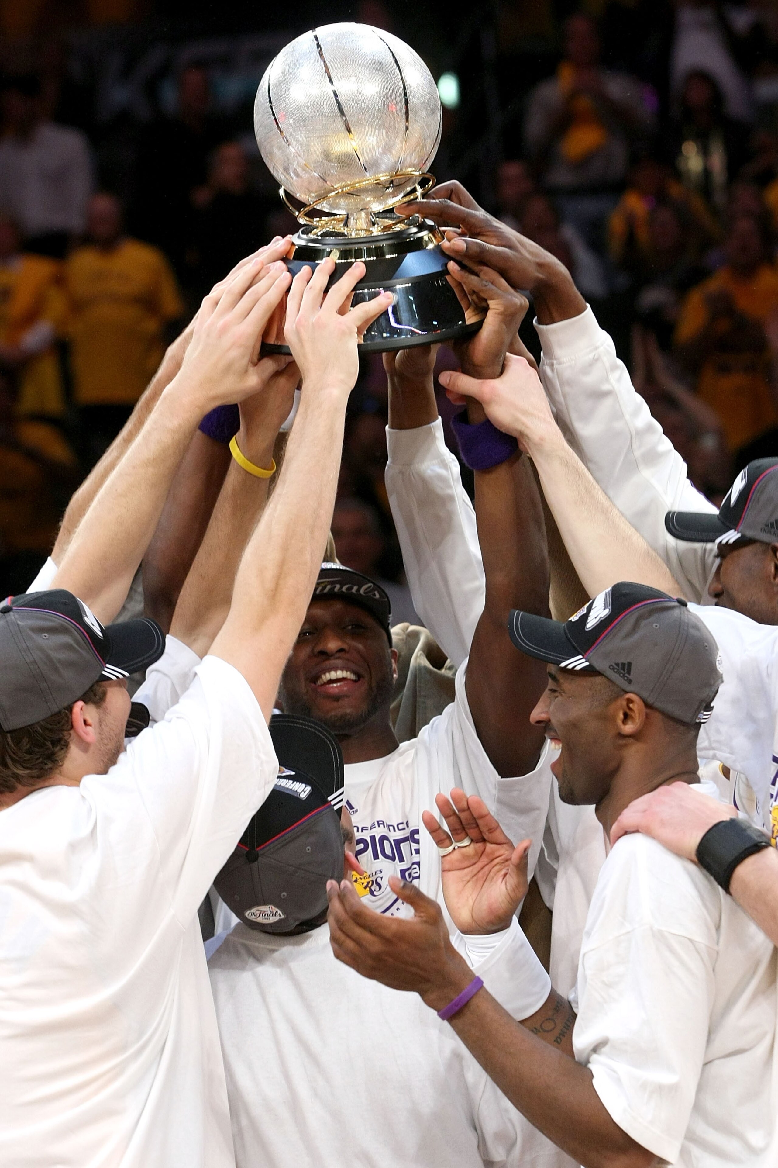 LOS ANGELES, CA - MAY 29:  The Los Angeles Lakers hold up at the Western Conference Championship trophy after they defeated the San Antonio Spurs in Game Five of the Western Conference Finals during the 2008 NBA Playoffs on May 29, 2008 at Staples Center