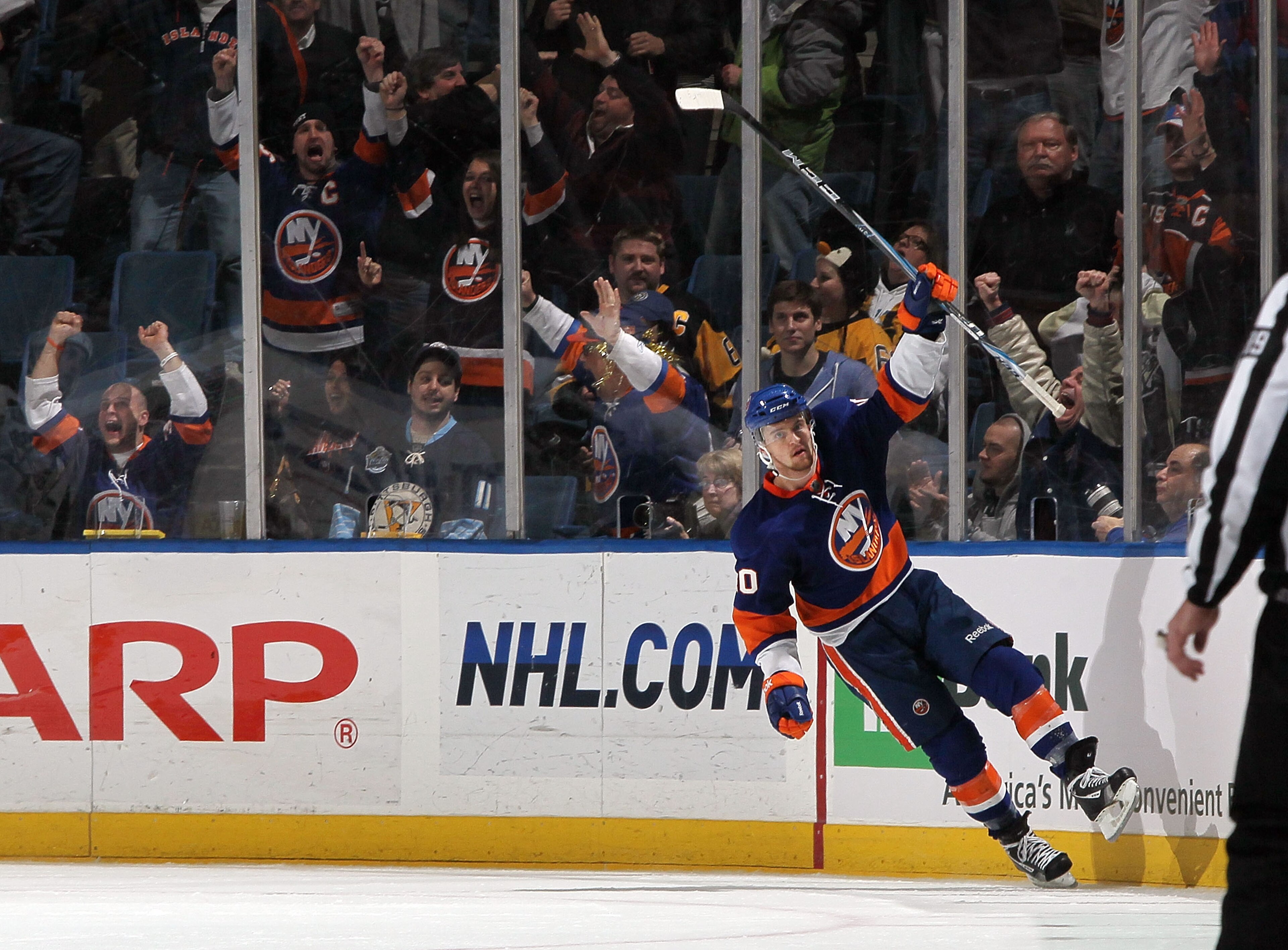 UNIONDALE, NY - FEBRUARY 11:  Michael Grabner #40 of the New York Islanders celebrates his second goal against the Pittsburgh Penguins on February 11, 2011 at Nassau Coliseum in Uniondale, New York. The Isles defeated the Pens 9-3.  (Photo by Jim McIsaac/