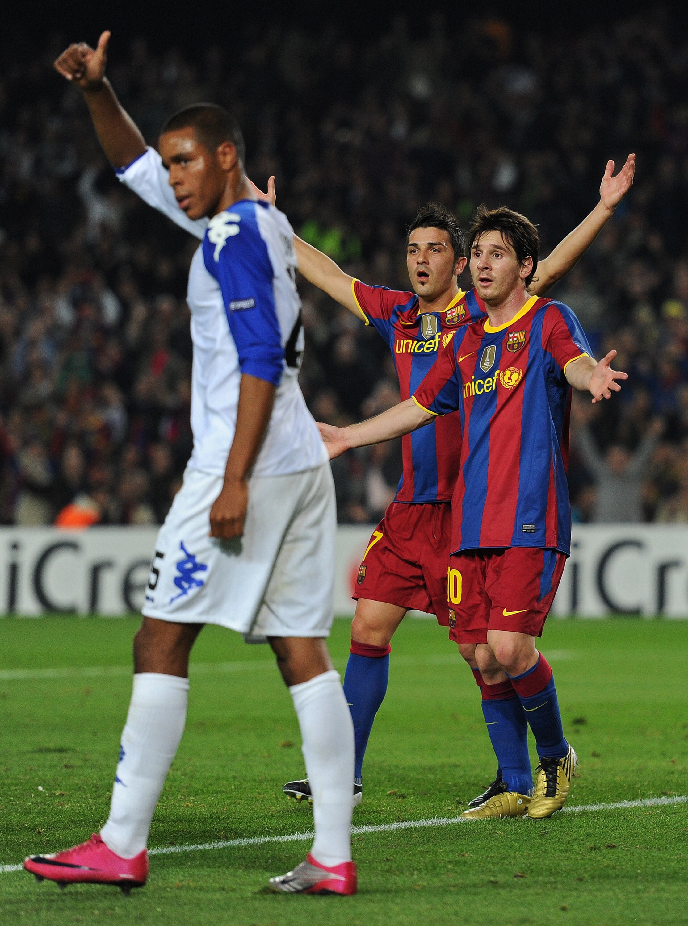 BARCELONA, SPAIN - OCTOBER 20:  Lionel Messi of Barcelona (R) reacts with his teammate David Villa after Messi's goal was disallowed during the UEFA Champions League group D match between Barcelona and FC Copenhagen at the Camp Nou stadium on October 20, 