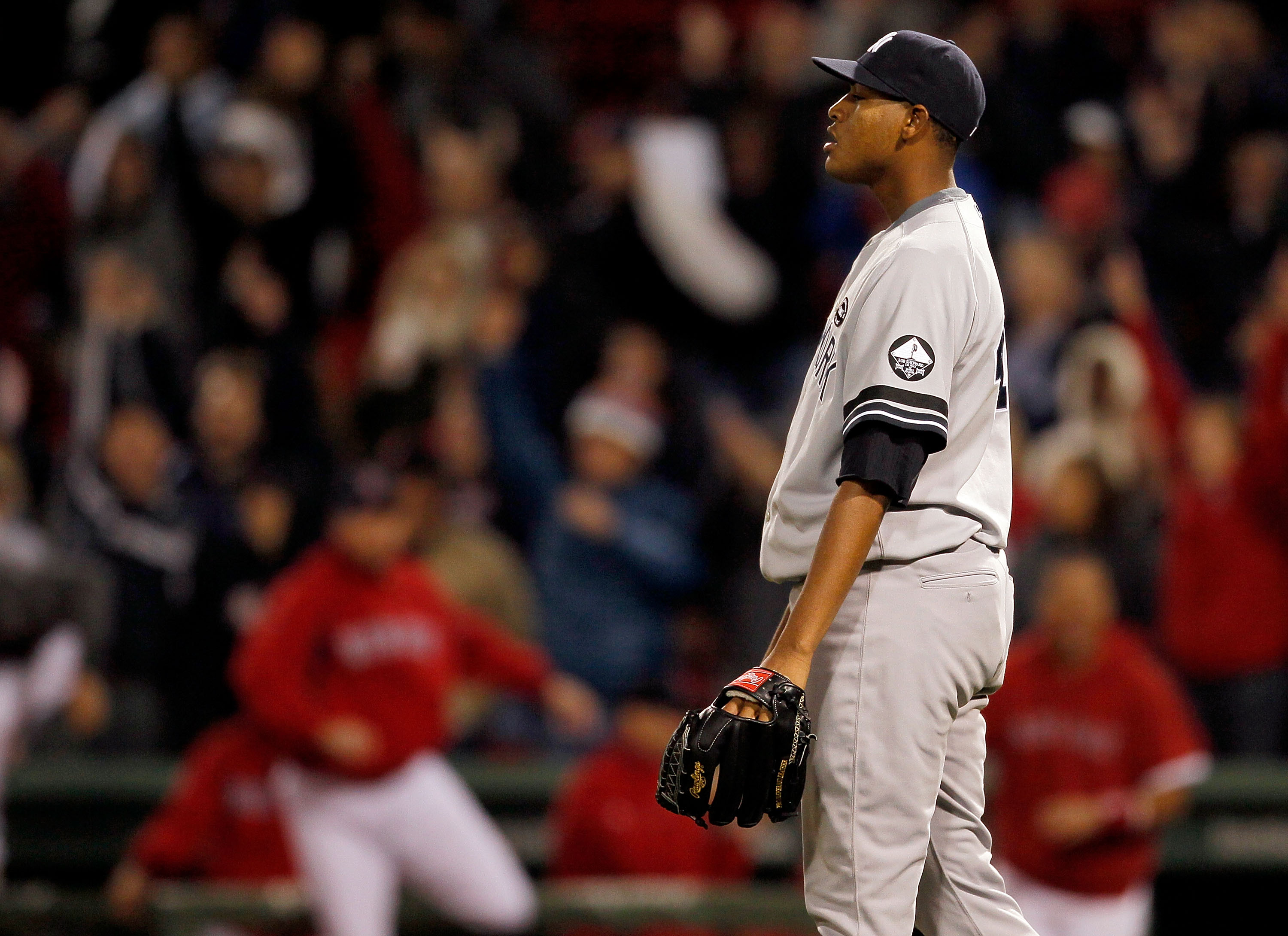 BOSTON - OCTOBER 2:  Ivan Nova #47 of the New York Yankees reacts in the tenth inning after he allowed a hit to Eric Petterson #3 of the Boston Red Sox , which knocked in the winning run in the second game of a doubleheader at Fenway Park, October 2, 2010