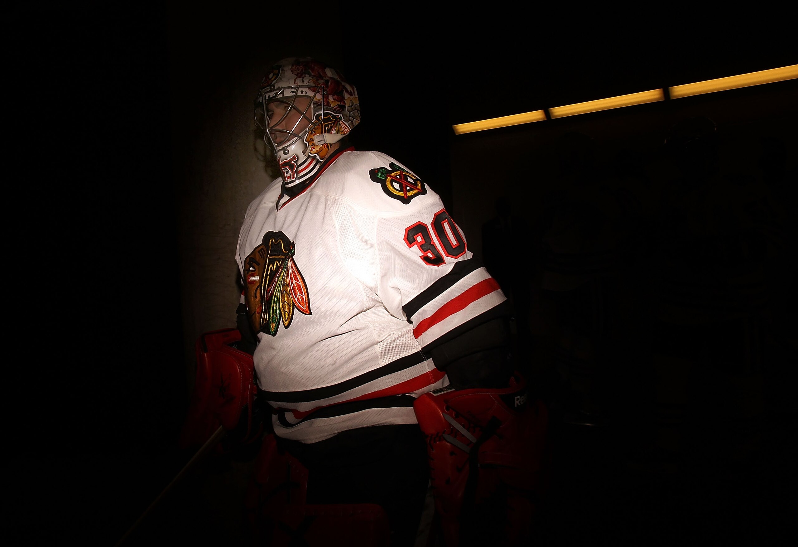 DALLAS, TX - FEBRUARY 11:  Goaltender Marty Turco #30 of the Chicago Blackhawks walks to the ice before a game against the Dallas Stars at American Airlines Center on February 11, 2011 in Dallas, Texas.  (Photo by Ronald Martinez/Getty Images)