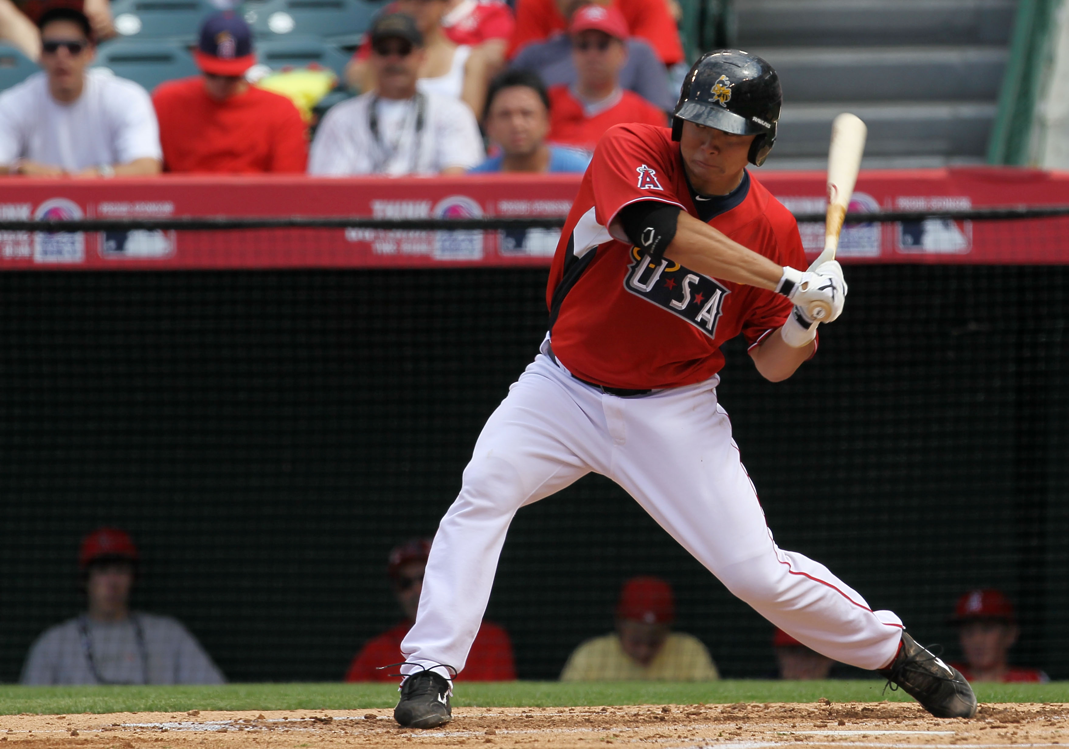 ANAHEIM, CA - JULY 11:  U.S. Futures All-Star Hank Conger #24 of the Los Angeles Angels of Anaheim at bat during the 2010 XM All-Star Futures Game at Angel Stadium of Anaheim on July 11, 2010 in Anaheim, California.  (Photo by Stephen Dunn/Getty Images)