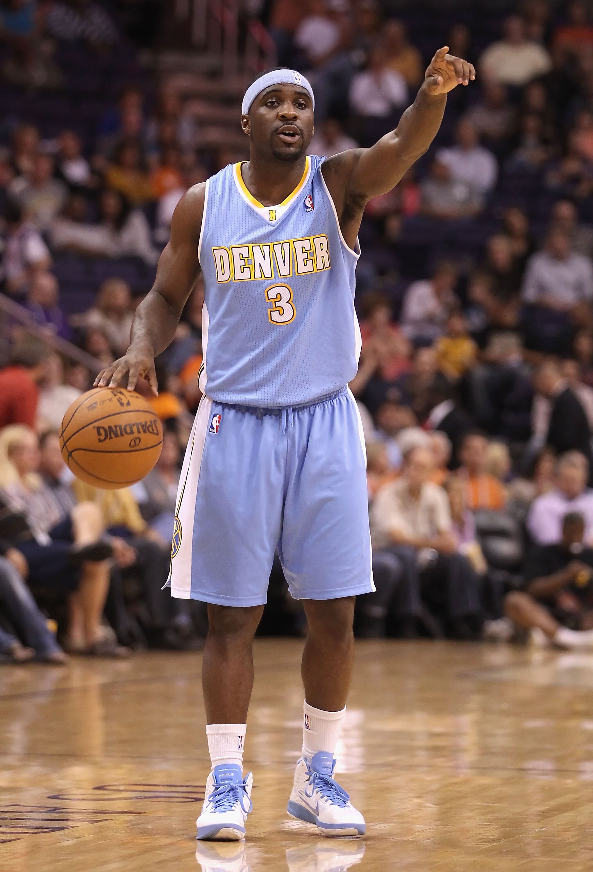 PHOENIX - OCTOBER 22:  Ty Lawson #3 of the Denver Nuggets handles the ball during the preseason NBA game against the Phoenix Suns at US Airways Center on October 22, 2010 in Phoenix, Arizona. NOTE TO USER: User expressly acknowledges and agrees that, by d