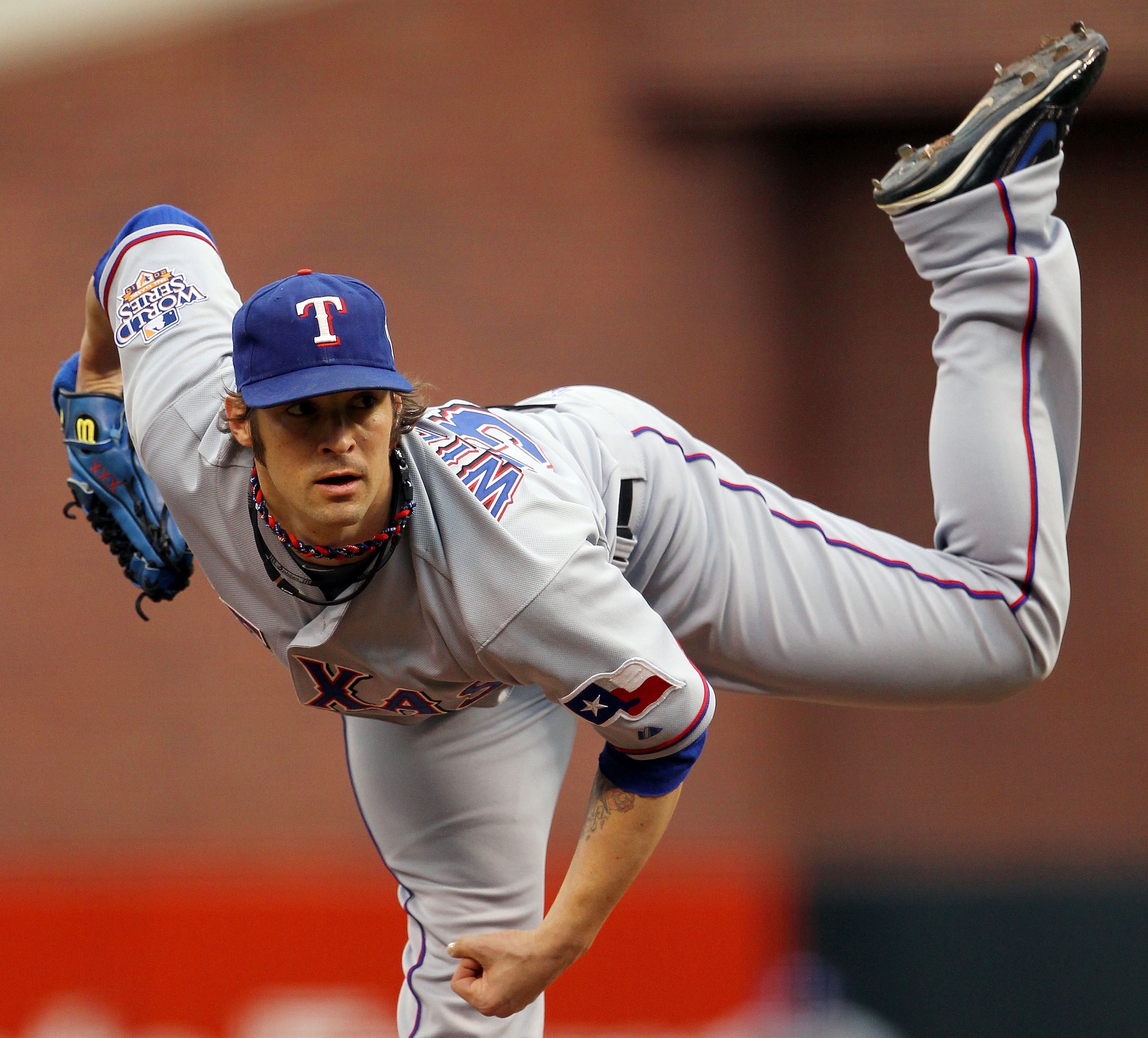 SAN FRANCISCO - OCTOBER 28:  Starting pitcher C.J. Wilson #36 of the Texas Rangers pitches in the first inning against the San Francisco Giants in Game Two of the 2010 MLB World Series at AT&T Park on October 28, 2010 in San Francisco, California.  (Photo