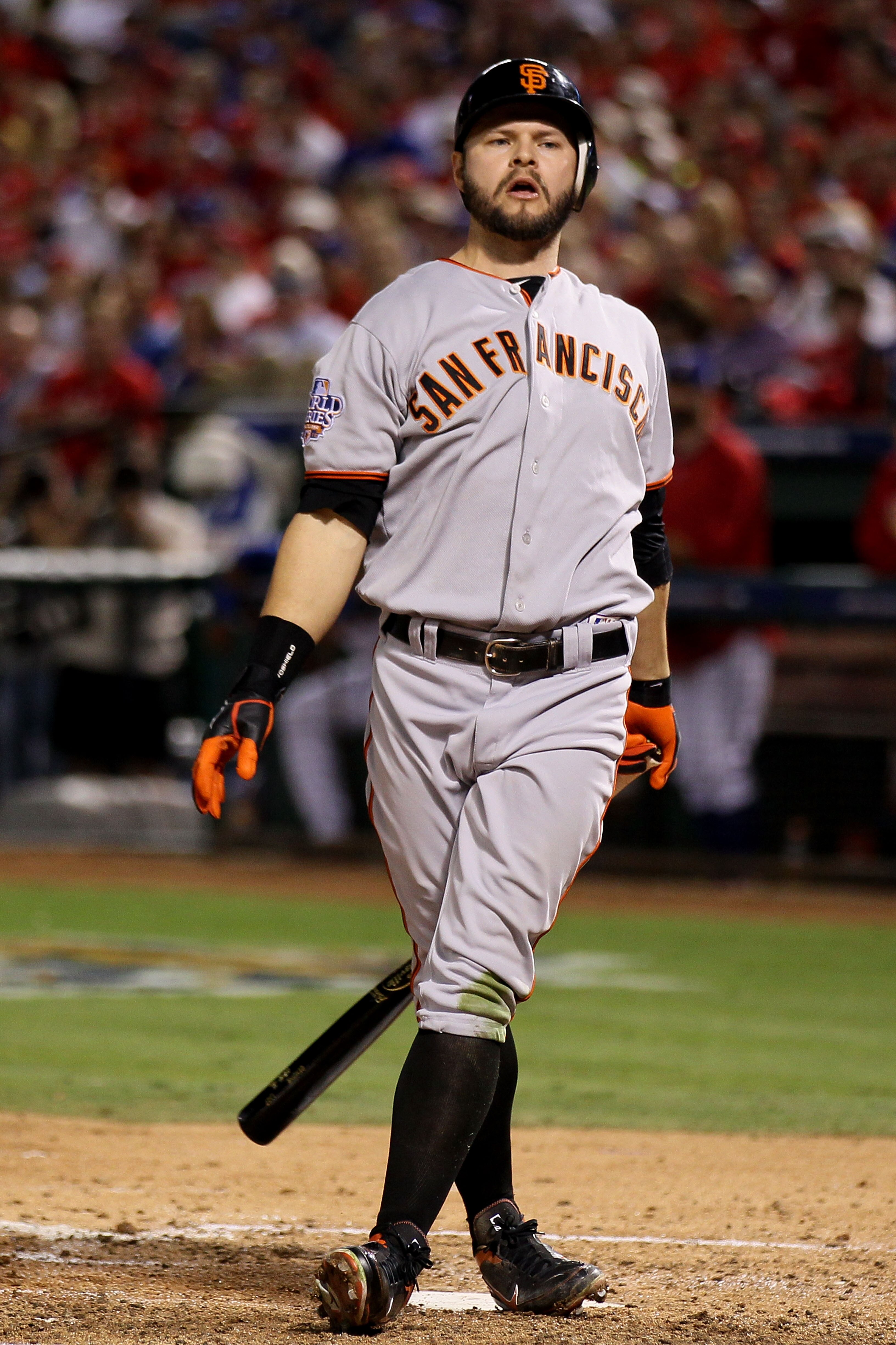 ARLINGTON, TX - OCTOBER 31:  Cody Ross #13 of the San Francisco Giants reacts after he struck out in the sixth inning against the Texas Rangers in Game Four of the 2010 MLB World Series at Rangers Ballpark in Arlington on October 31, 2010 in Arlington, Te