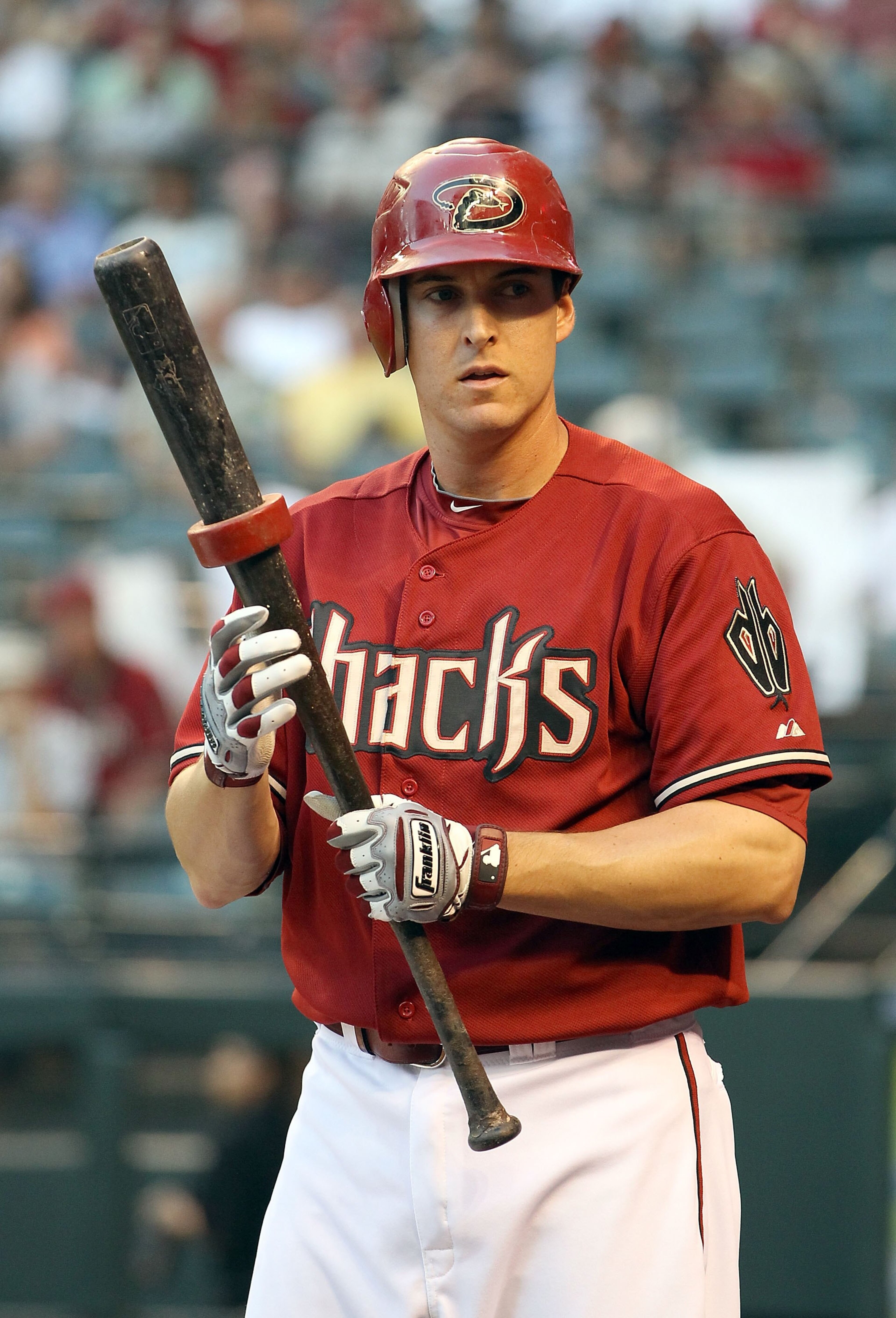 PHOENIX - MAY 19:  Kelly Johnson #2 of the Arizona Diamondbacks warms up on deck during the Major League Baseball game against the San Francisco Giants at Chase Field on May 19, 2010 in Phoenix, Arizona.  The Diamondbacks defeated the Giants 13-1.  (Photo