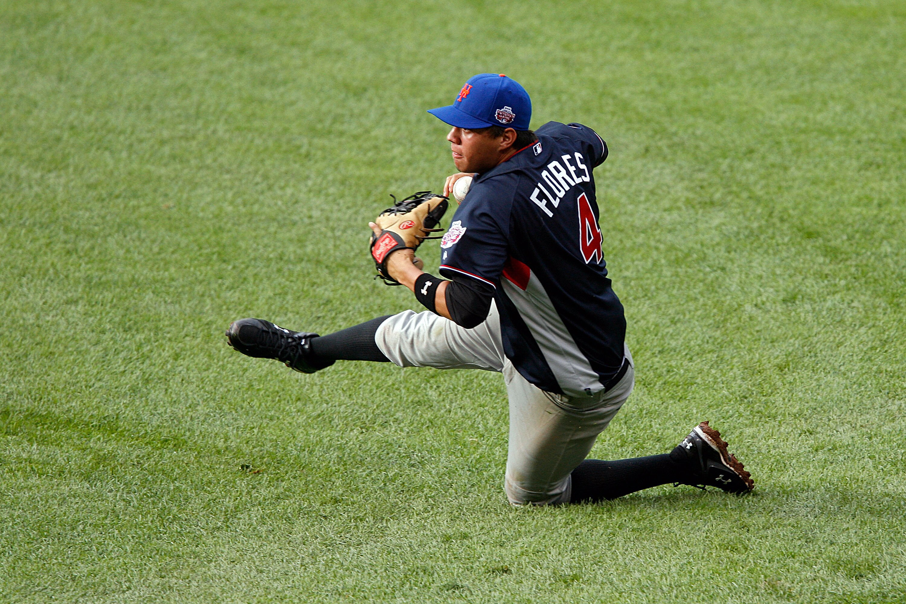 ST LOUIS, MO - JULY 12:  World Futures All-Star Wilmer Flores of the New York Mets dives to make a play during the 2009 XM All-Star Futures Game at Busch Stadium on July 12, 2009 the in St. Louis, Missouri.  (Photo by Dilip Vishwanat/Getty Images)