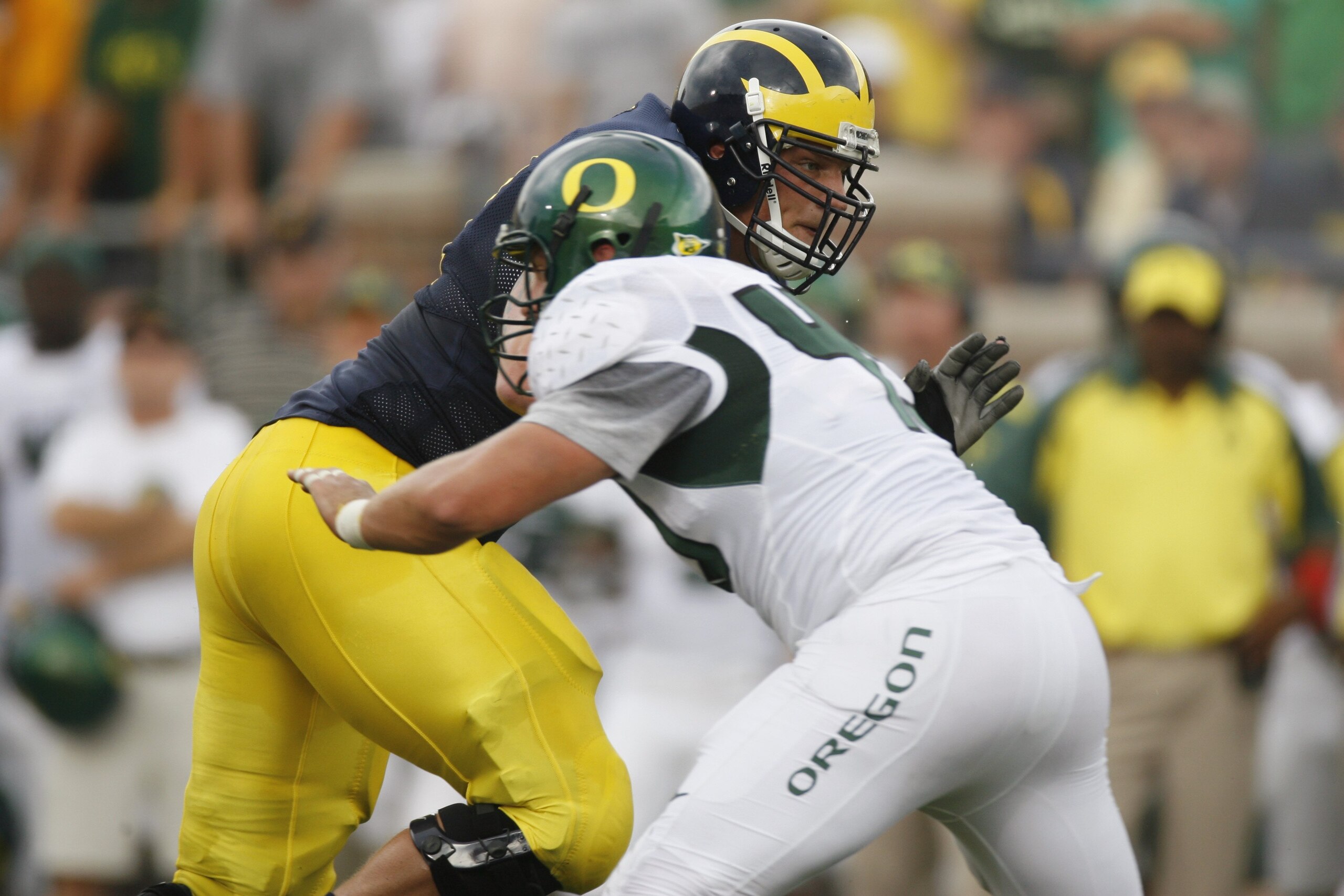 ANN ARBOR, MI - SEPTEMBER 08: Jake Long #77 of the Michigan Wolverines blocks against the Oregon Ducks during their game on September 8, 2007 at Michigan Stadium in Ann Arbor, Michigan. The Ducks defeated the Wolverines 39-7. (Photo By Gregory Shamus/Ge ANN ARBOR, MI - SEPTEMBER 08: Jake Long #77 of the Michigan Wolverines blocks against the Oregon Ducks during their game on September 8, 2007 at Michigan Stadium in Ann Arbor, Michigan. The Ducks defeated the Wolverines 39-7. (Photo By Gregory Shamus/Ge