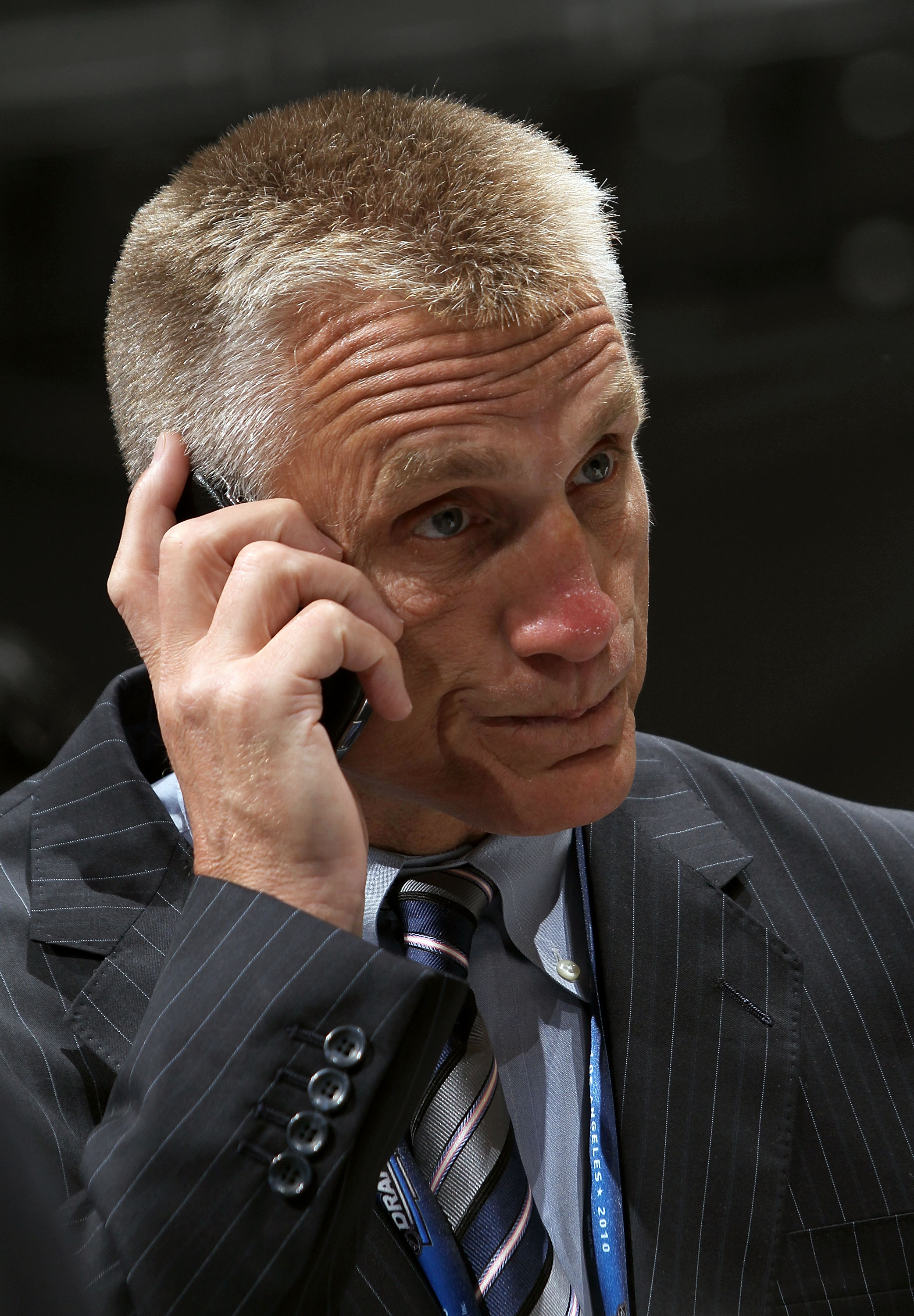 LOS ANGELES, CA - JUNE 25:  Philadelphia Flyers General Manager Paul Holmgren speaks on the phone during the 2010 NHL Entry Draft at Staples Center on June 25, 2010 in Los Angeles, California.  (Photo by Bruce Bennett/Getty Images)