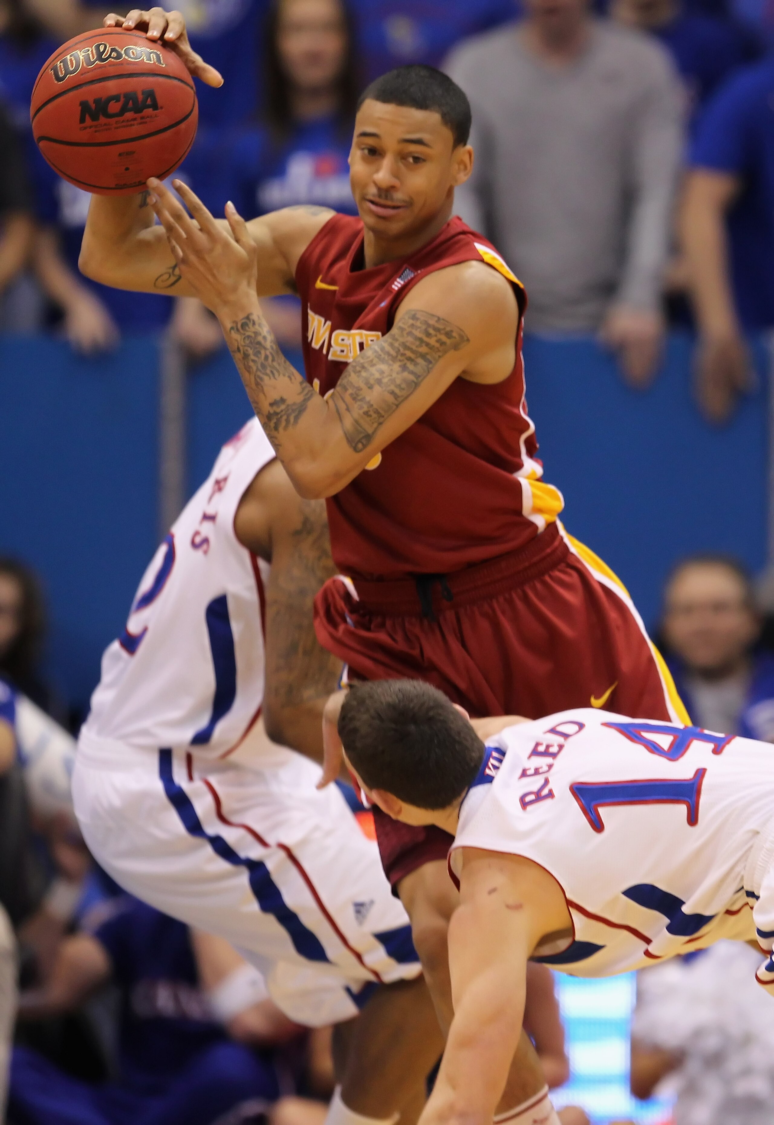 LAWRENCE, KS - FEBRUARY 12:  Diante Garrett #10 of the Iowa State Cyclones passes during the game against the Kansas Jayhawks on February 12, 2011 at Allen Fieldhouse in Lawrence, Kansas.  (Photo by Jamie Squire/Getty Images)