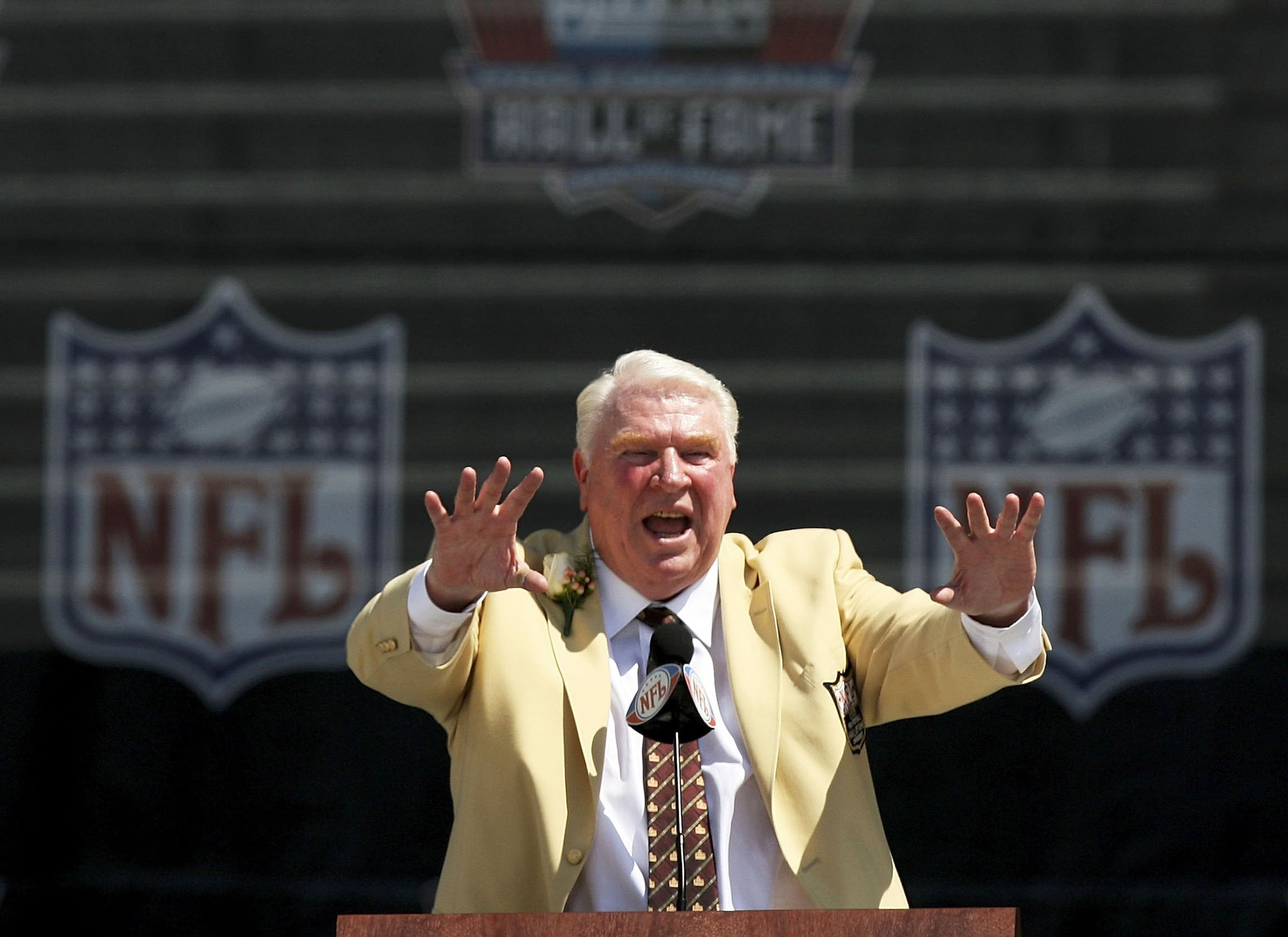 CANTON, OH - AUGUST 05: Broadcaster and former coach John Madden speaks during his induction during the Class of 2006 Pro Football Hall of Fame Enshrinement Ceremony at Fawcett Stadium on August 5, 2006 in Canton, Ohio. (Photo by Doug Benc/Getty Images) CANTON, OH - AUGUST 05: Broadcaster and former coach John Madden speaks during his induction during the Class of 2006 Pro Football Hall of Fame Enshrinement Ceremony at Fawcett Stadium on August 5, 2006 in Canton, Ohio. (Photo by Doug Benc/Getty Images)