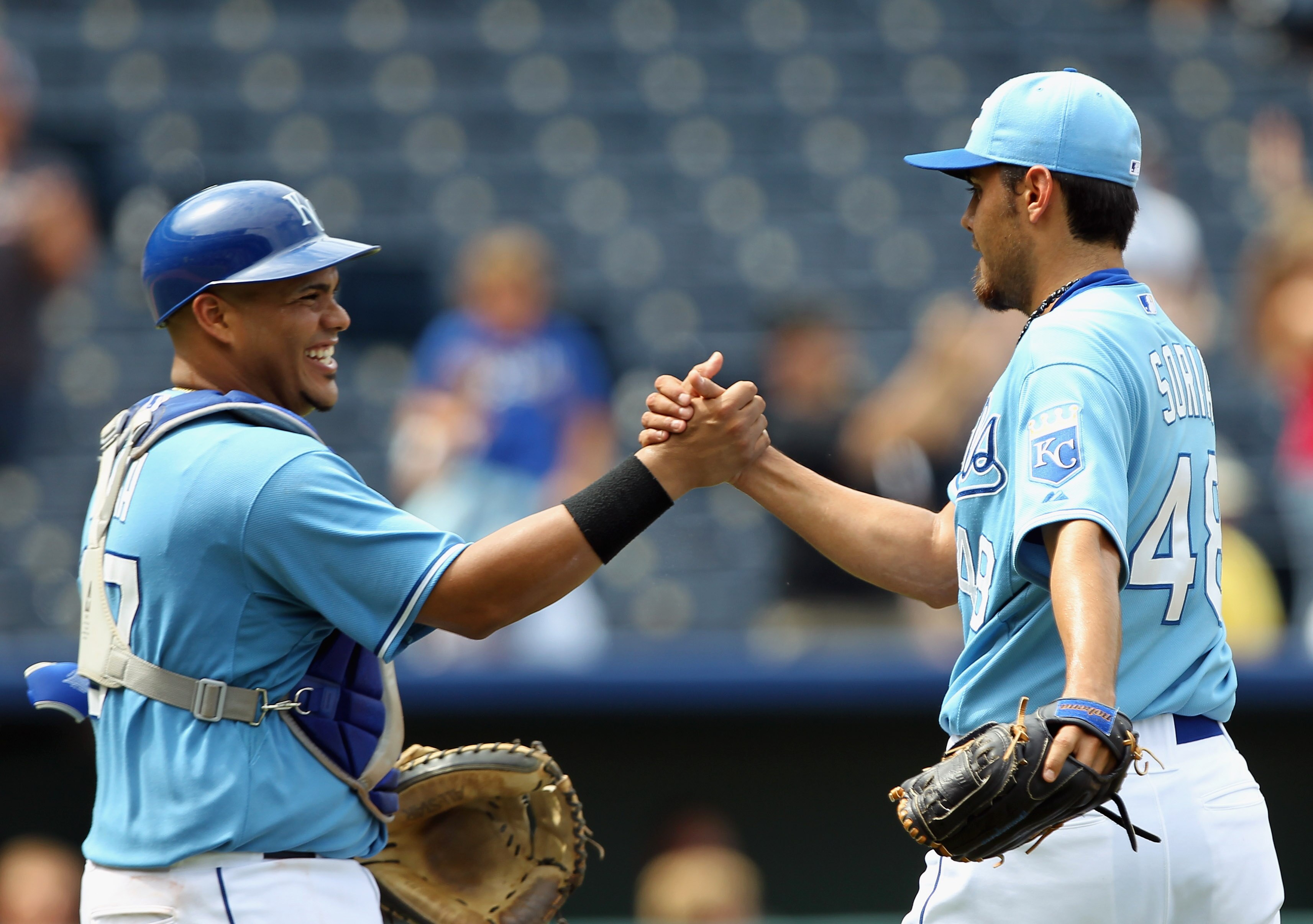 KANSAS CITY, MO - JULY 21:  Catcher Brayan Pena #27 of the Kansas City Royals congratulates closing pitcher Joakim Soria #48 after the Royals defeated the Toronto Blue Jays 5-2 at Kauffman Stadium on July 21, 2010 in Kansas City, Missouri.  (Photo by Jami
